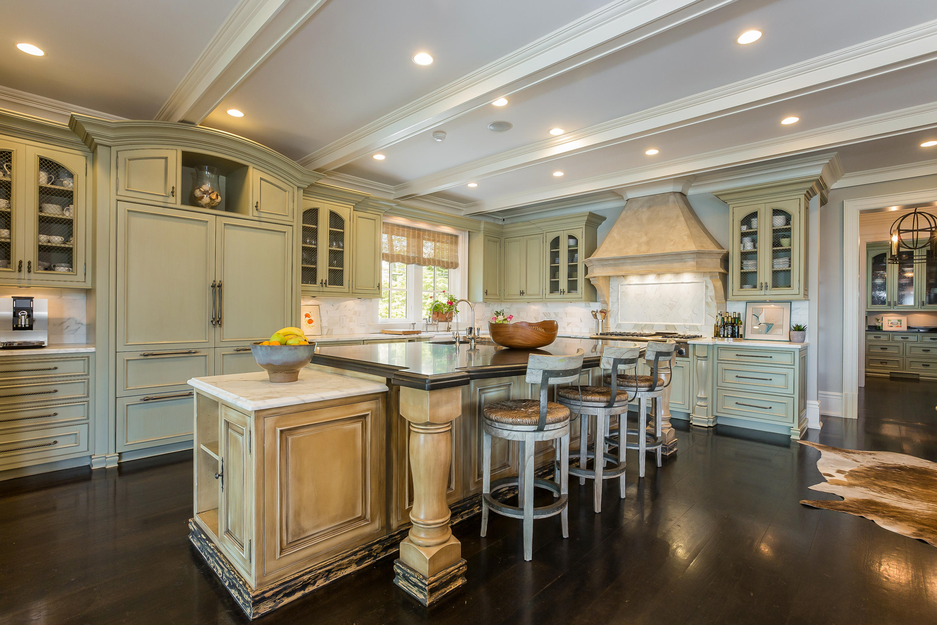 8 N Road Darien, CT 06820 - Photo 20 of 68 a kitchen with lots of counter space and painting on the wall