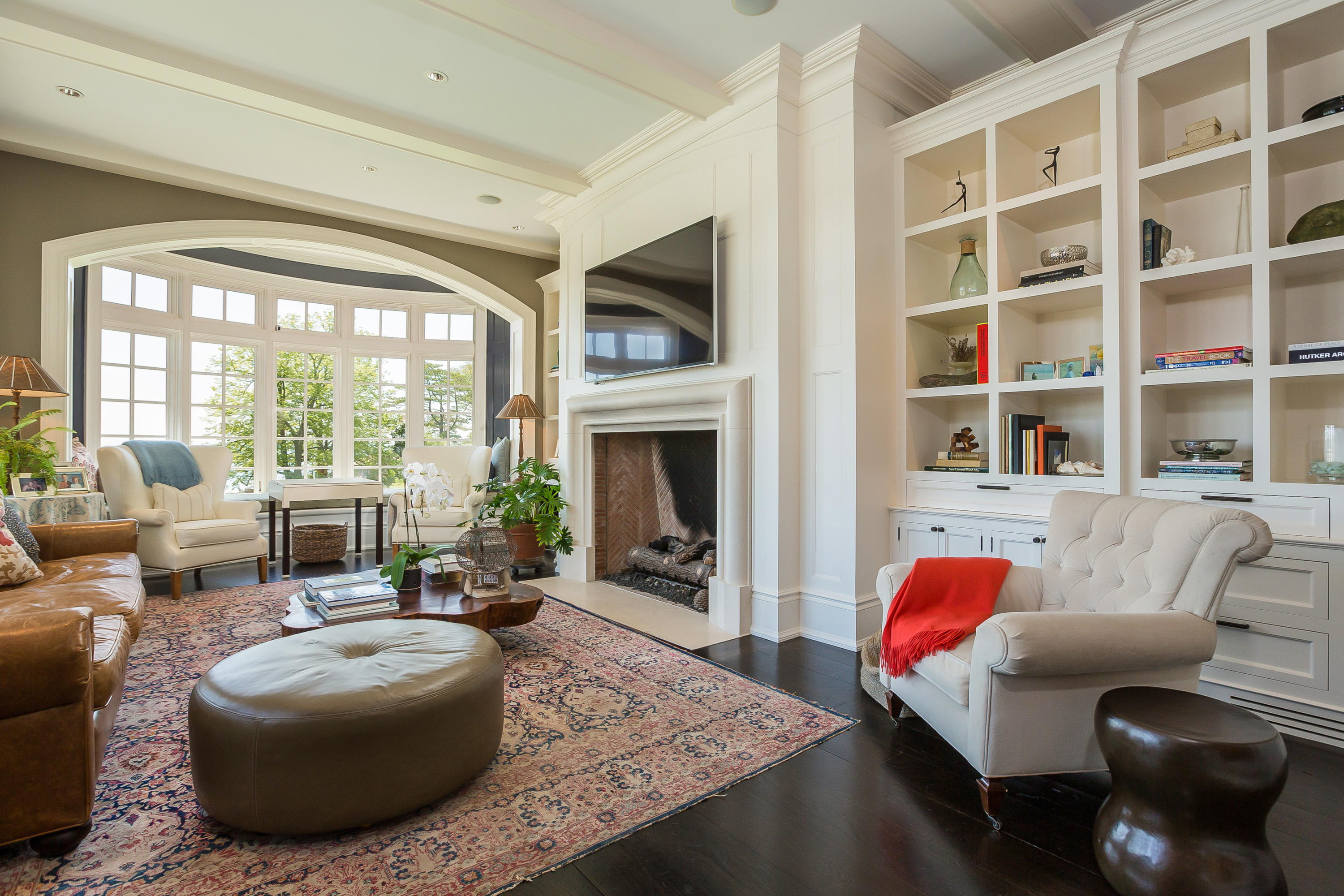 8 N Road Darien, CT 06820 - Photo 23 of 68 a living room with furniture and a fireplace