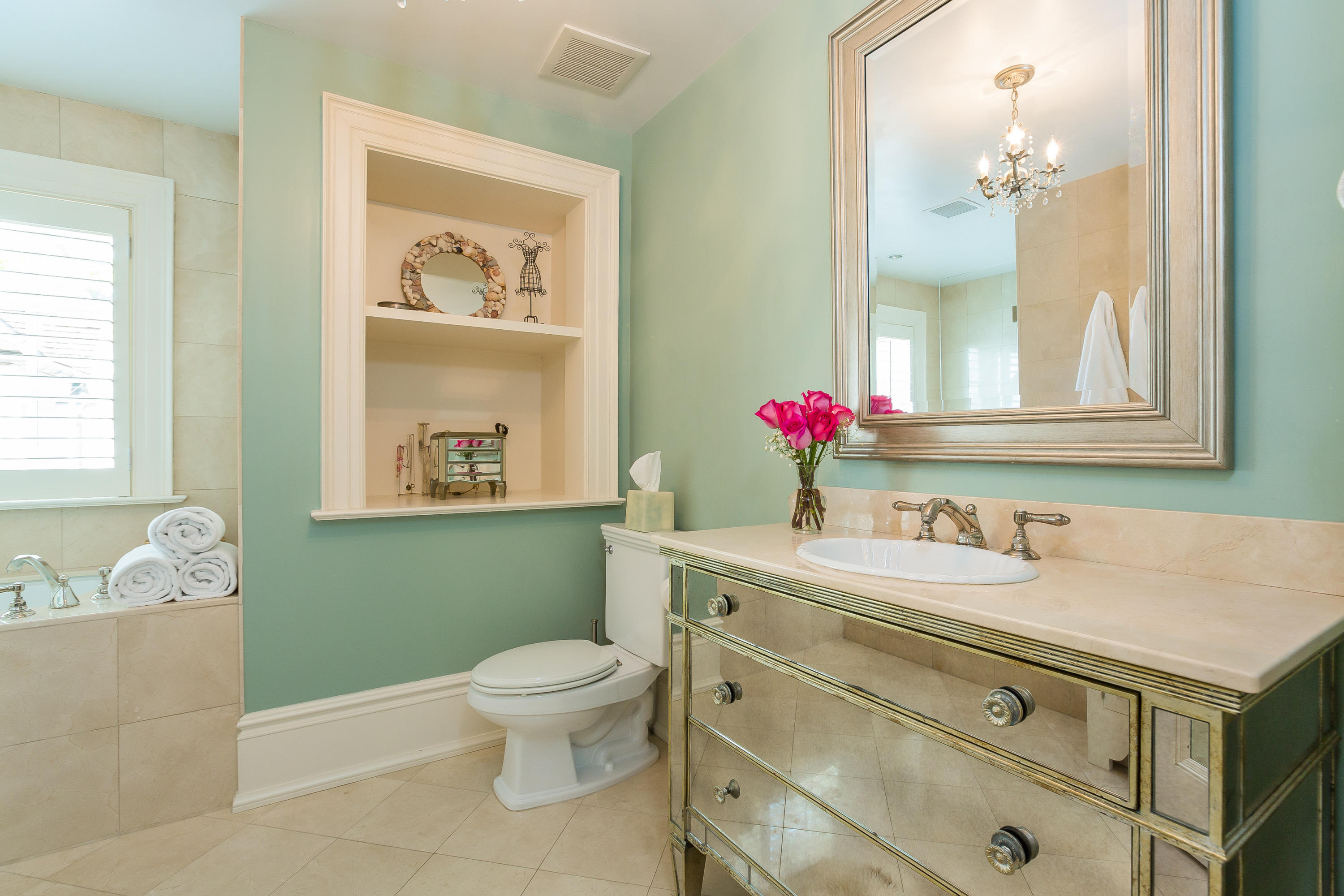 8 N Road Darien, CT 06820 - Photo 41 of 68 a bathroom with a toilet sink and mirror
