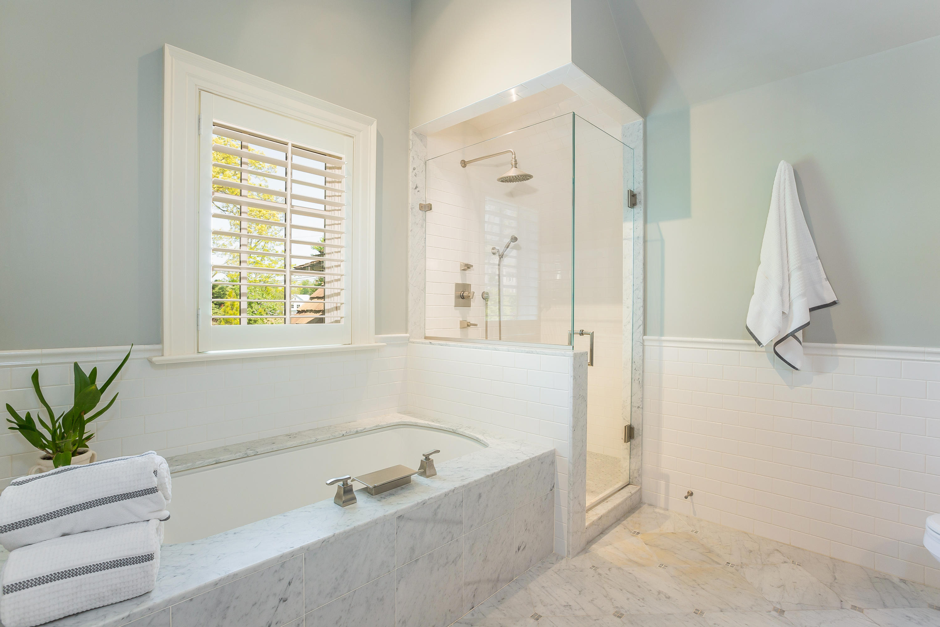 8 N Road Darien, CT 06820 - Photo 43 of 68 a bathroom with a tub shower and window