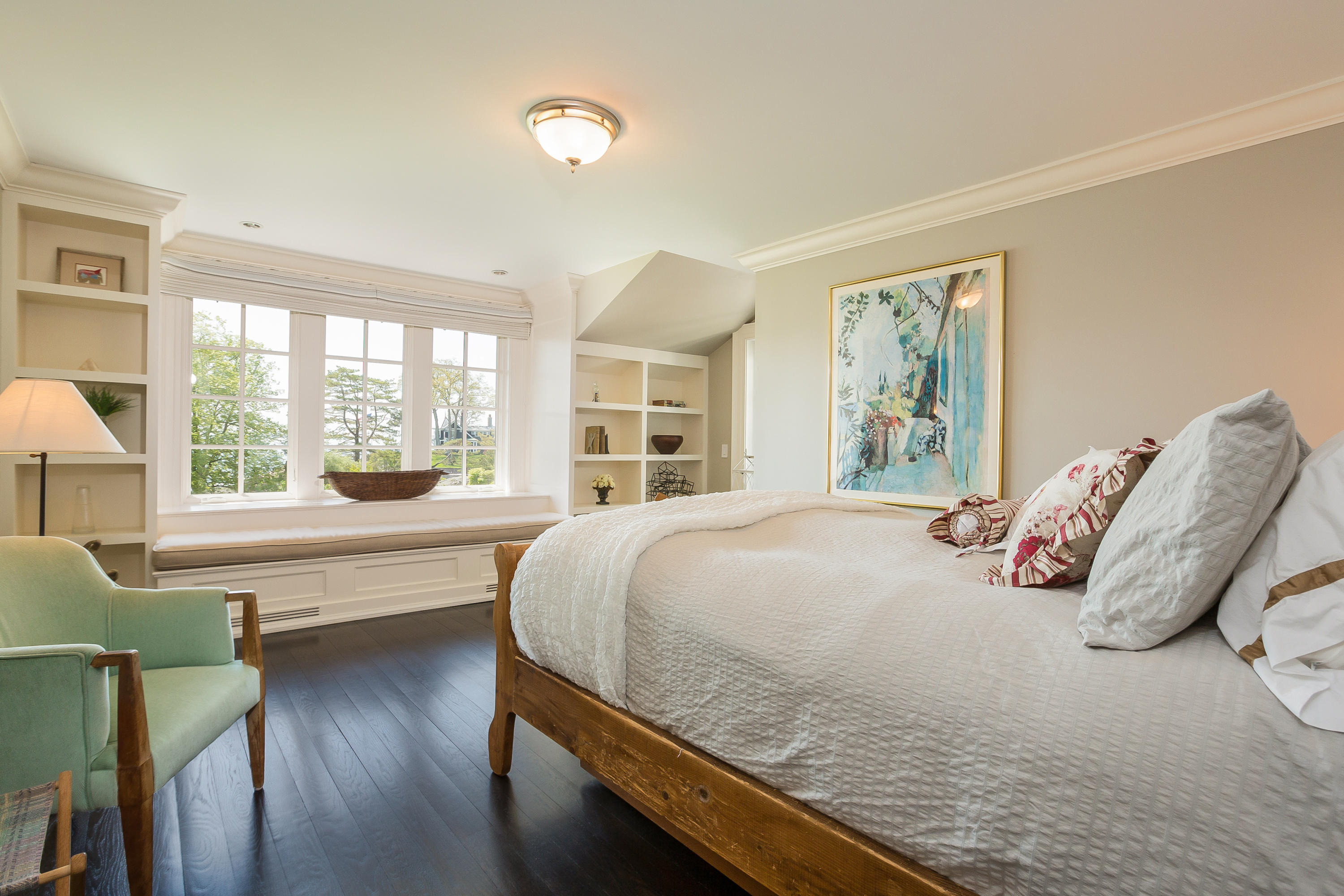 8 N Road Darien, CT 06820 - Photo 44 of 68 a bedroom with a large bed and a large window