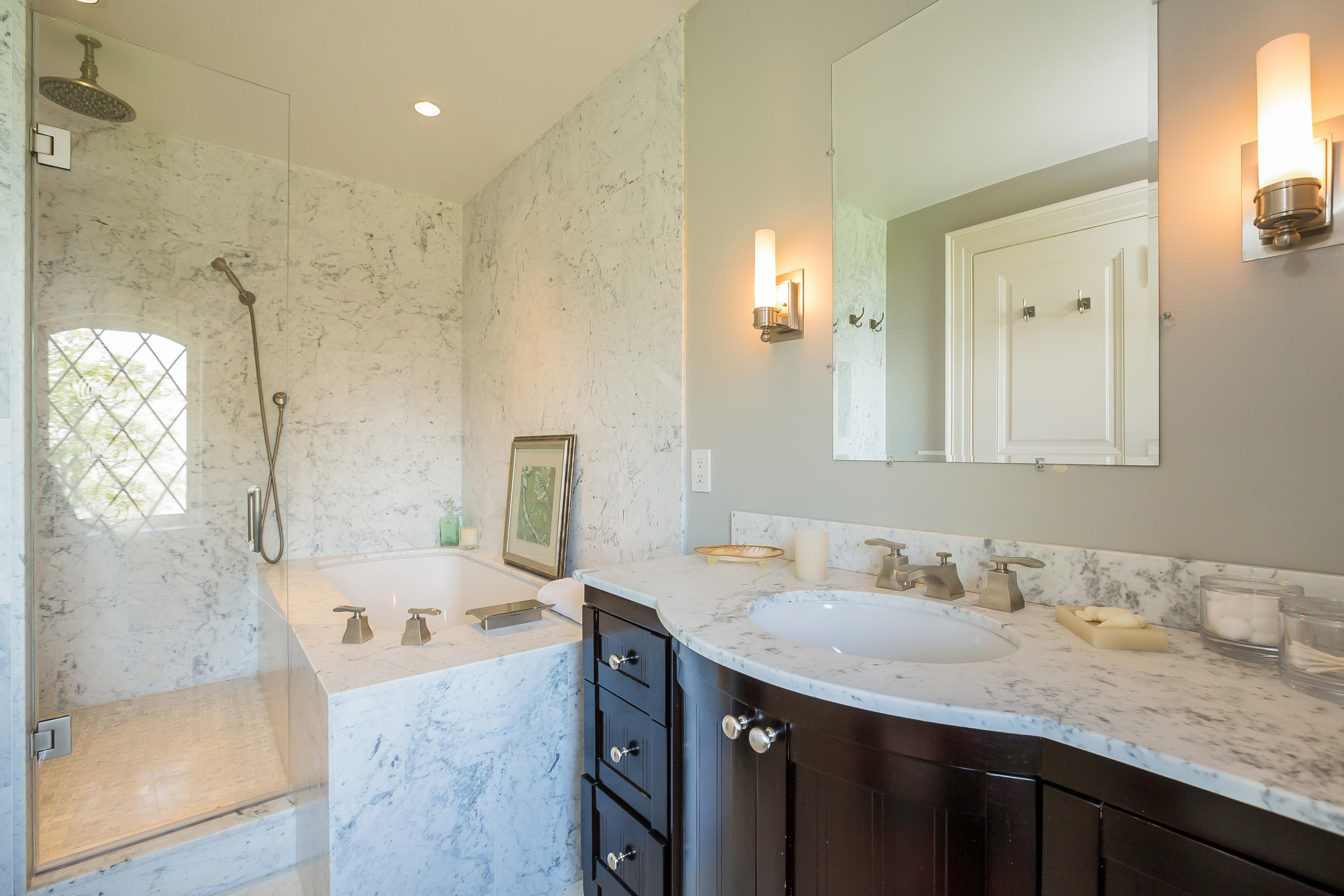 8 N Road Darien, CT 06820 - Photo 45 of 68 a bathroom with a granite countertop sink a mirror and a shower