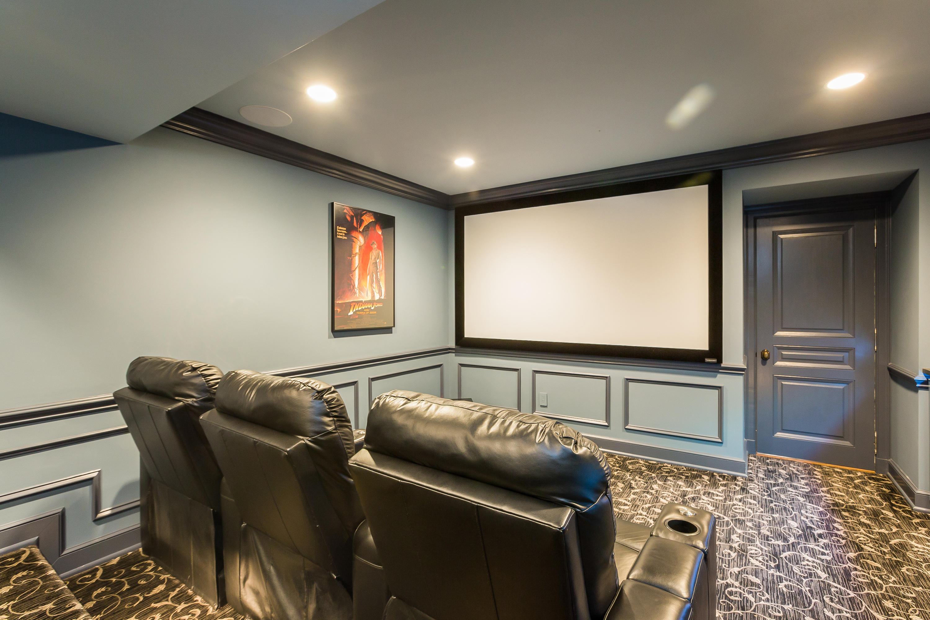 8 N Road Darien, CT 06820 - Photo 53 of 68 a room with furniture projector and screen