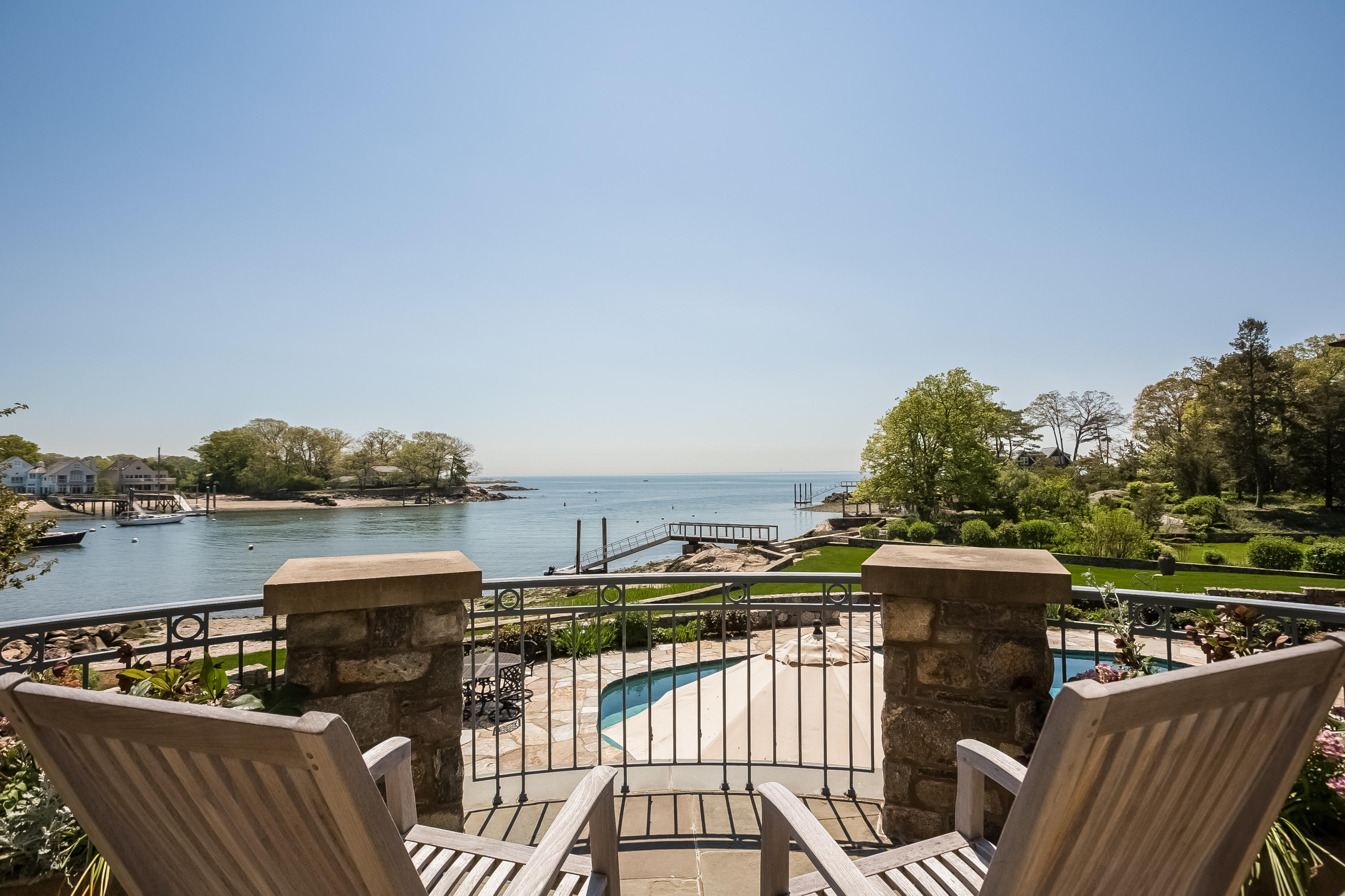 8 N Road Darien, CT 06820 - Photo 55 of 68 a view of a roof deck with couches and wooden floor