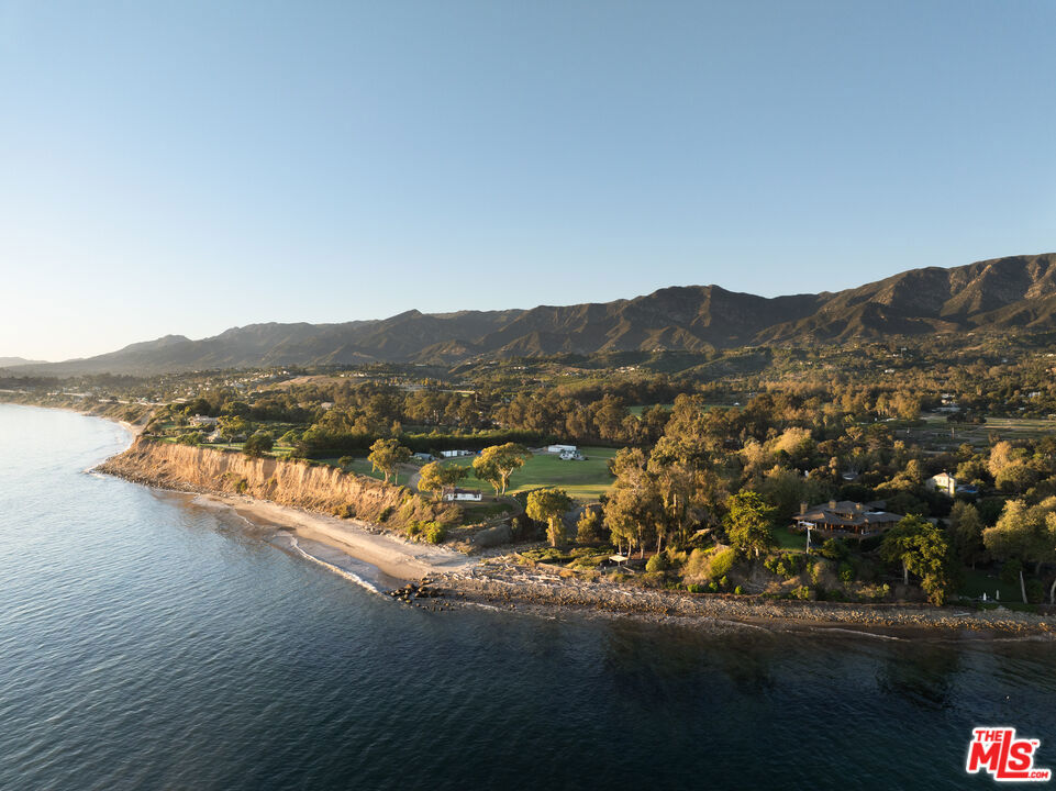 a view of a lake with mountain