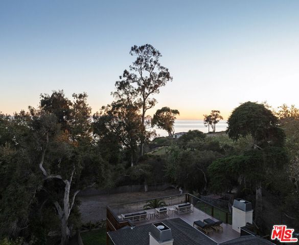 a view of a terrace with chairs