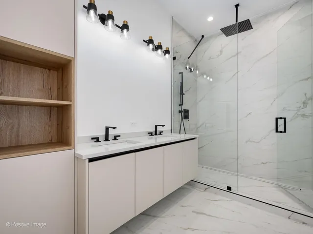 a bathroom with a sink and mirror