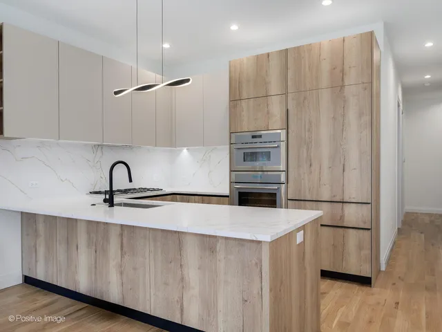 a view of a kitchen with a sink