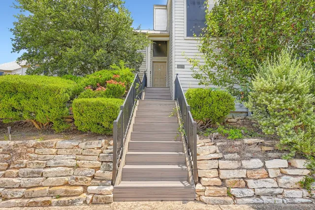 a view of swimming pool with seating area