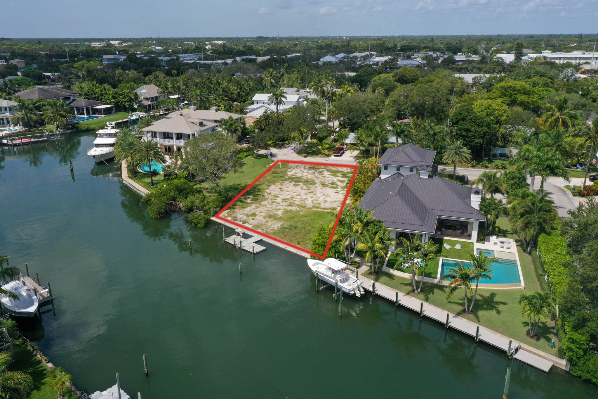 601 Waldemar Road Jupiter, FL 33477 - Photo 12 of 19 an aerial view of residential houses with outdoor space and lake view