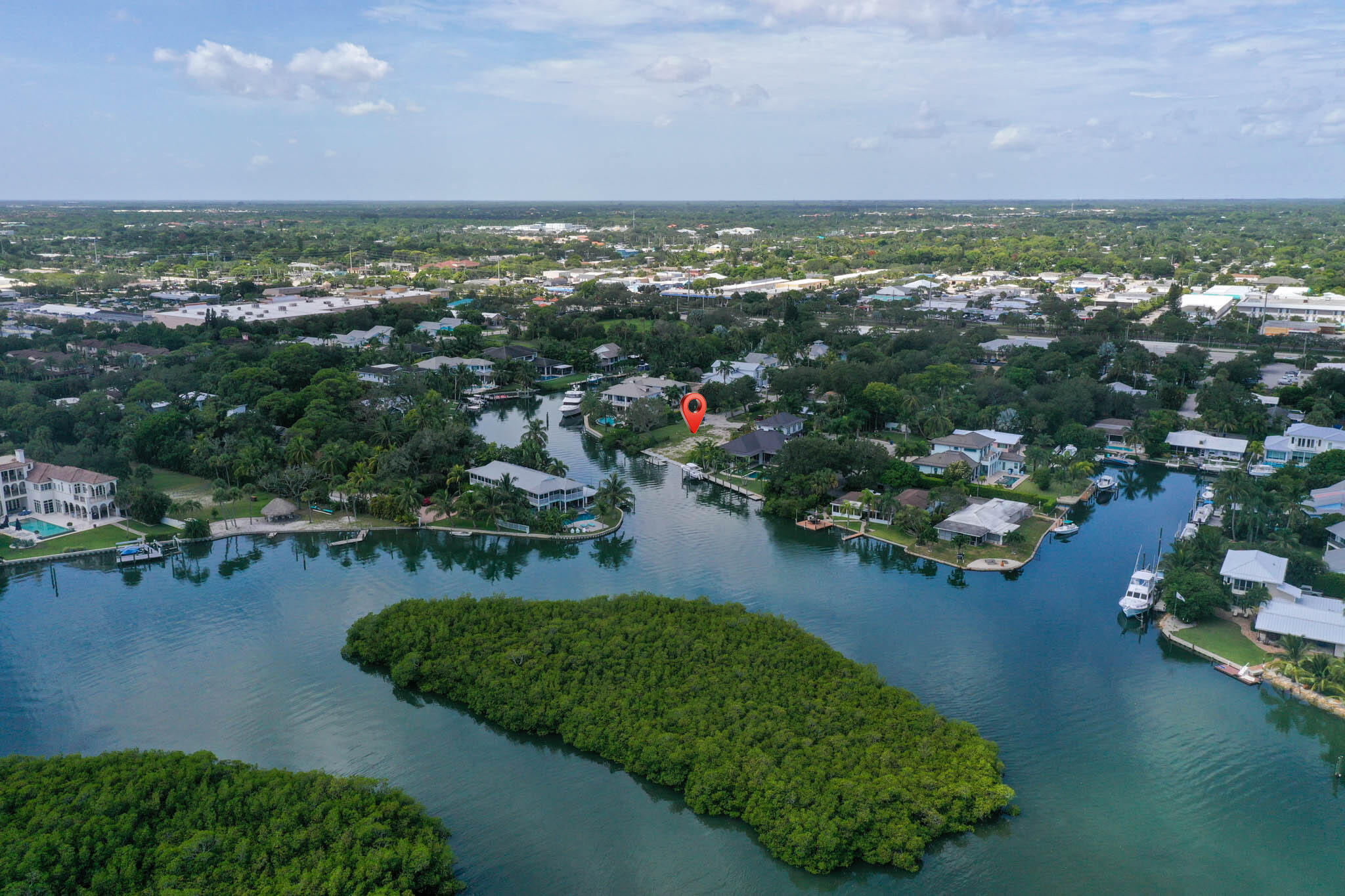 601 Waldemar Road Jupiter, FL 33477 - Photo 15 of 19 an aerial view of a house with a lake view