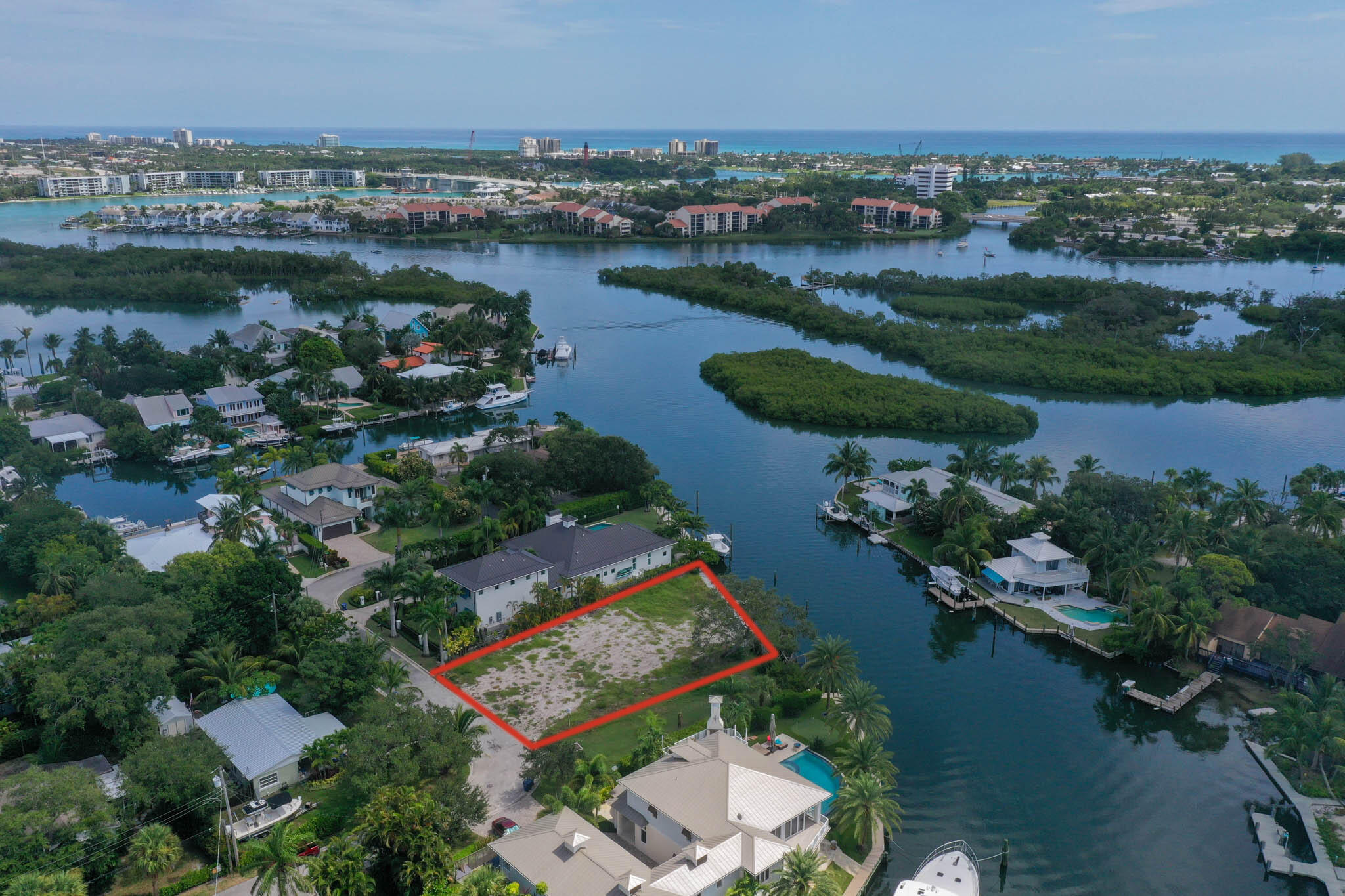 601 Waldemar Road Jupiter, FL 33477 - Photo 17 of 19 an aerial view of residential houses with outdoor space and lake view