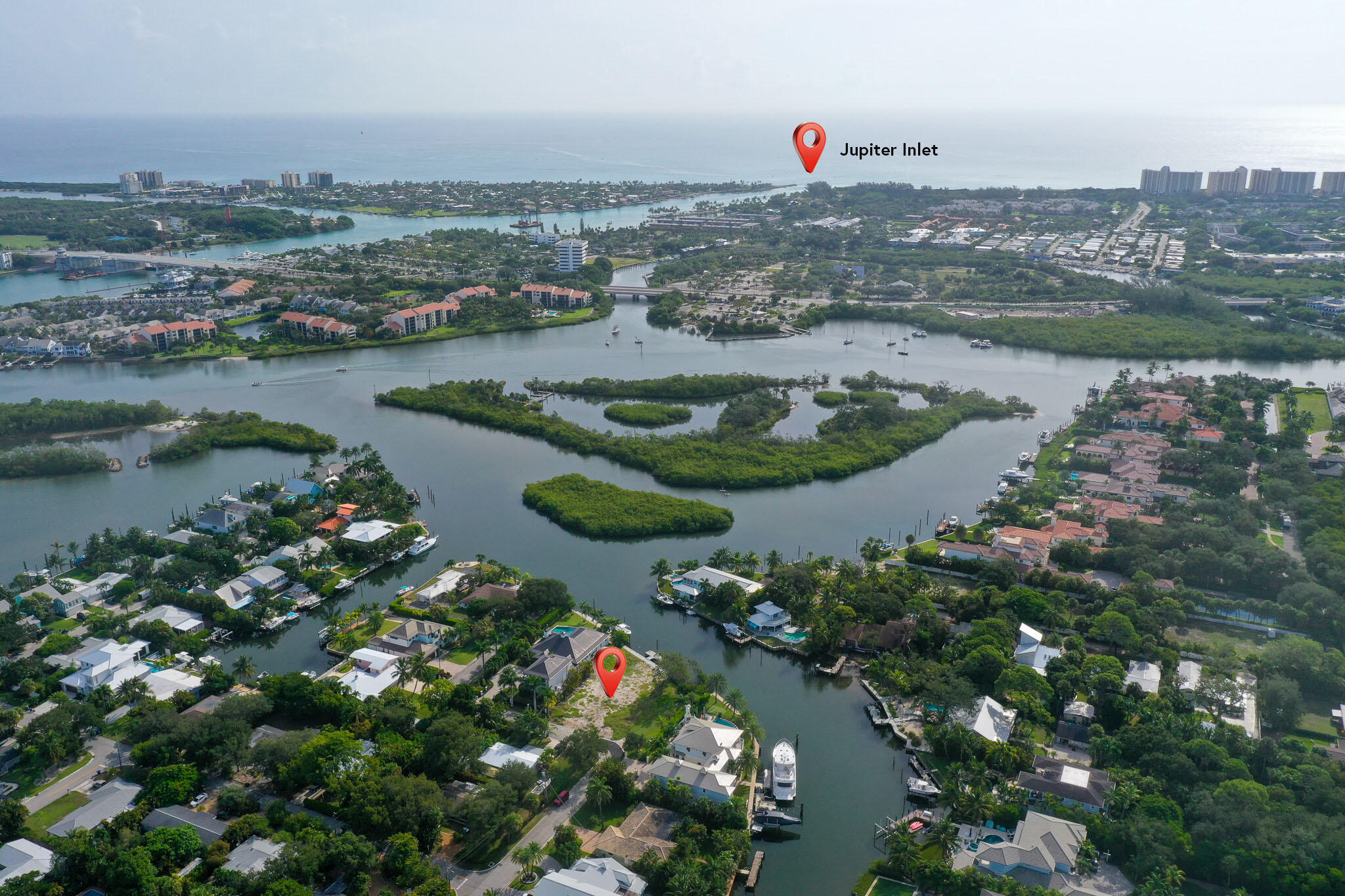 601 Waldemar Road Jupiter, FL 33477 - Photo 19 of 19 an aerial view of residential houses with outdoor space and river