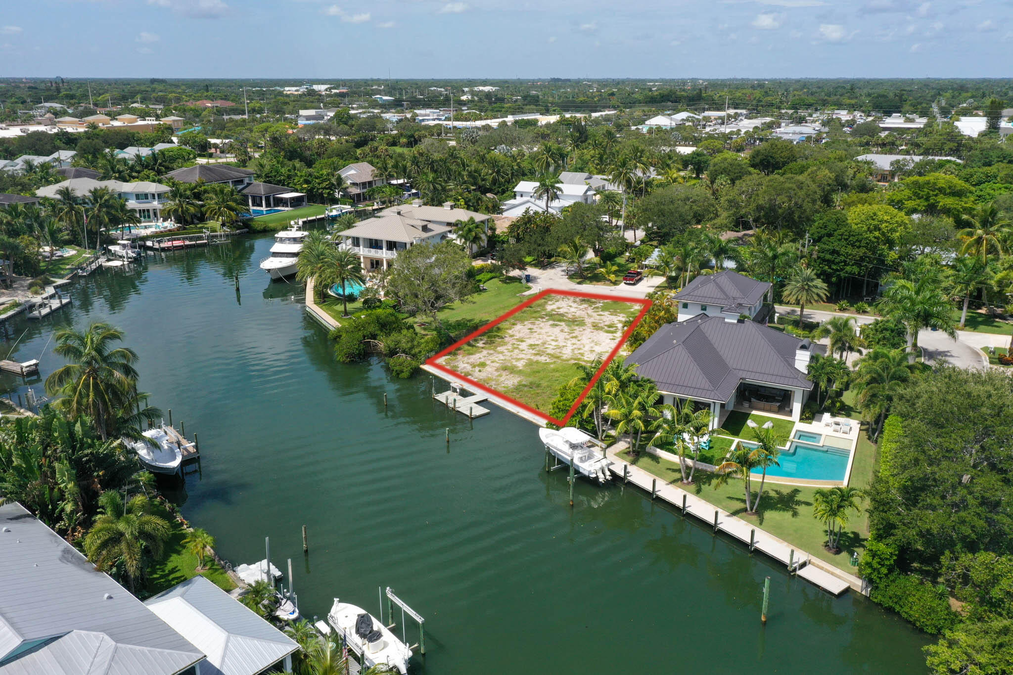 601 Waldemar Road Jupiter, FL 33477 - Photo 2 of 19 an aerial view of residential houses with outdoor space and lake view