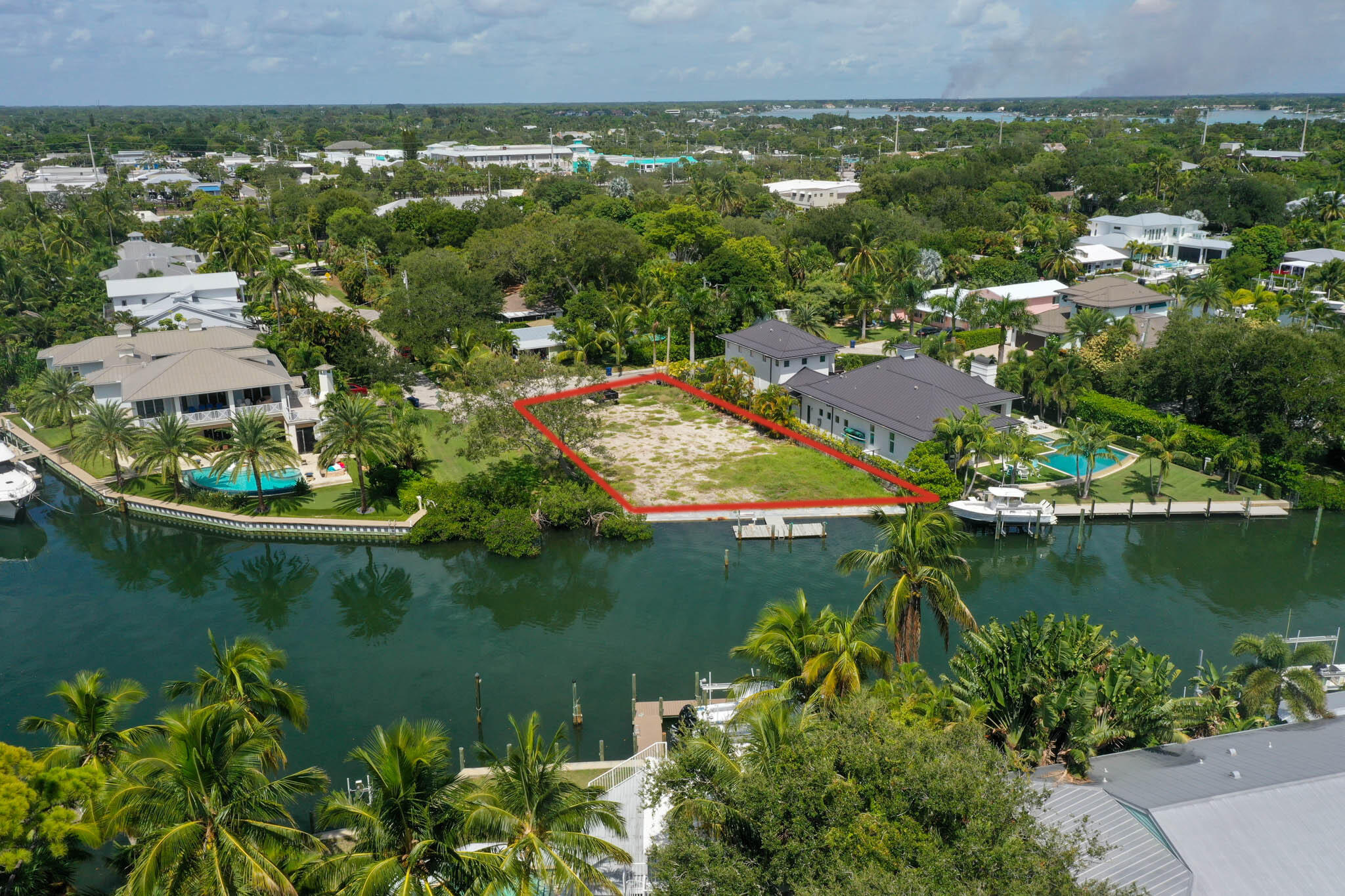 601 Waldemar Road Jupiter, FL 33477 - Photo 4 of 19 an aerial view of a house with a lake view