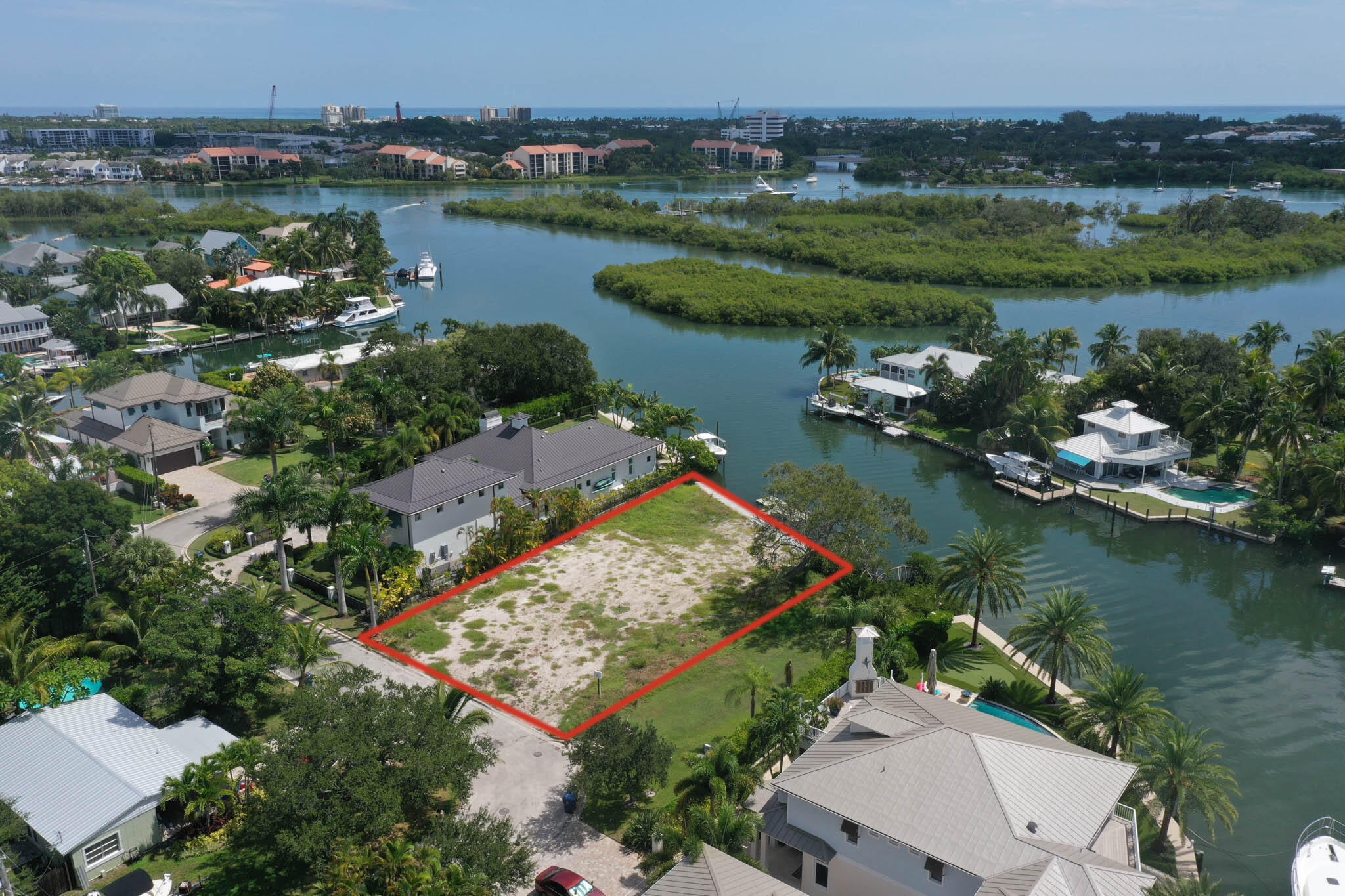 601 Waldemar Road Jupiter, FL 33477 - Photo 5 of 19 an aerial view of lake residential house with outdoor space and seating