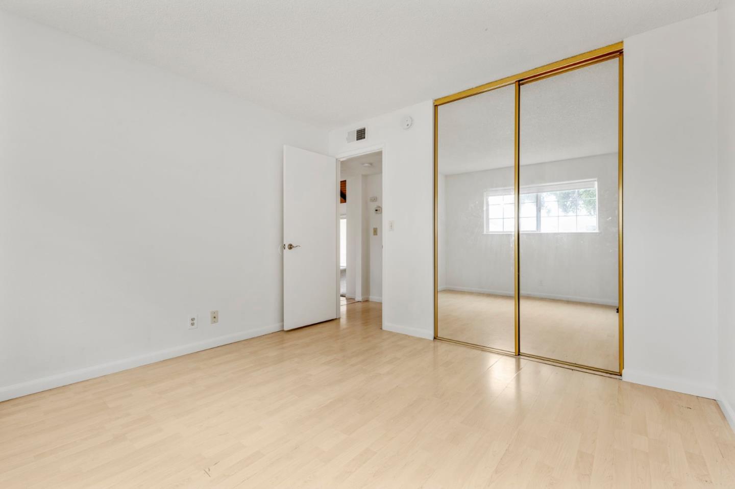 1604 Cherokee Drive Salinas, CA 93906 - Photo 12 of 22 an empty room with sliding glass door