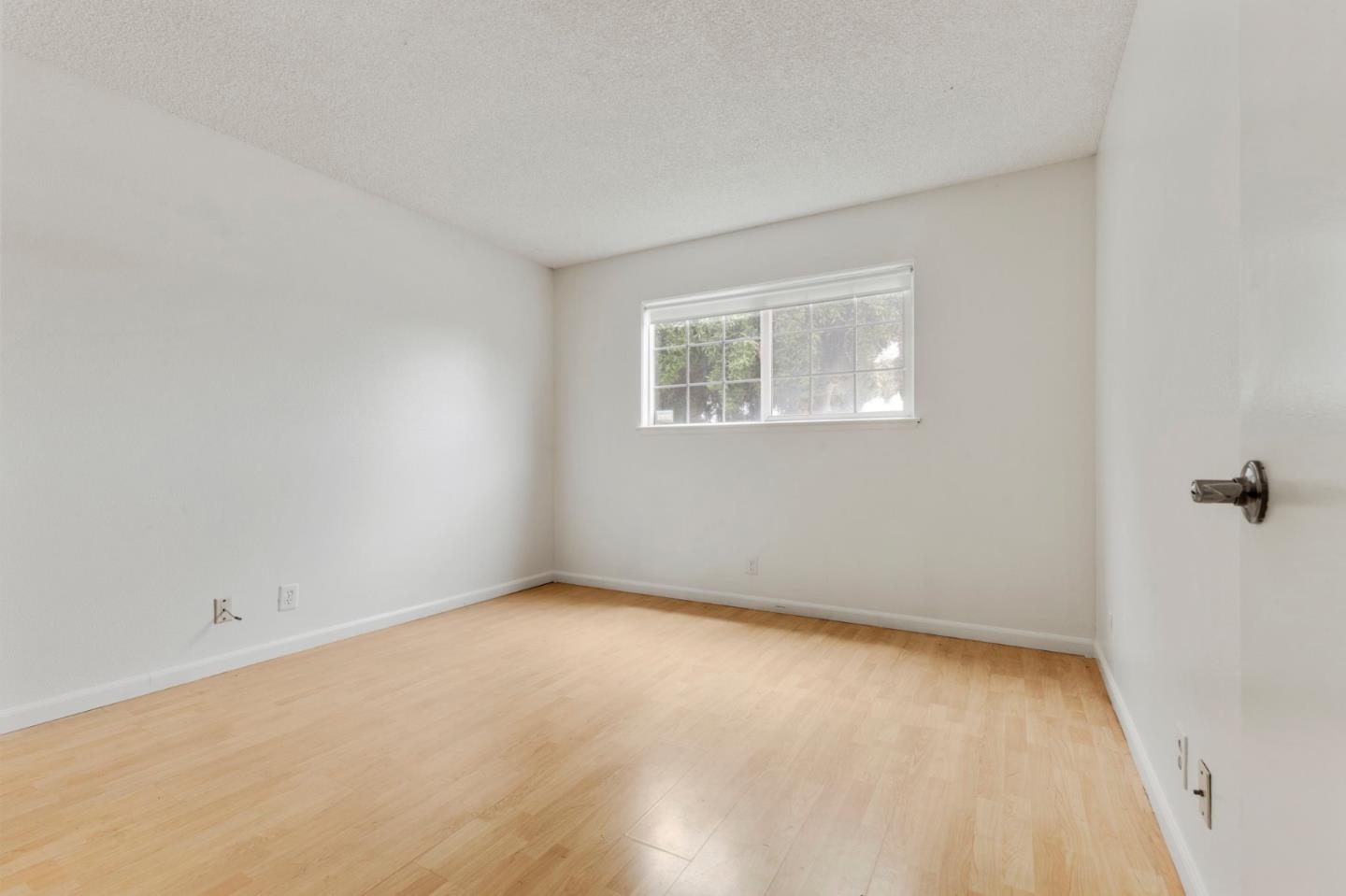 1604 Cherokee Drive Salinas, CA 93906 - Photo 13 of 22 an empty room with a window