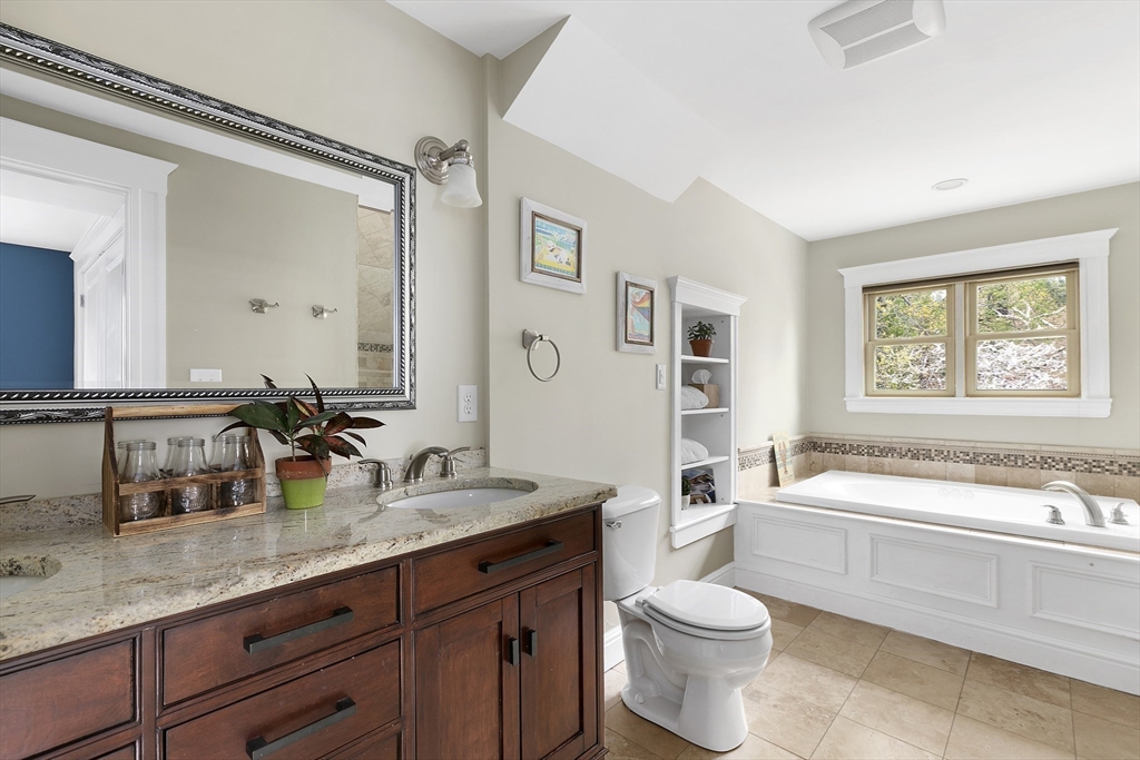 20 Hall Avenue, Unit 2 Somerville, MA 02144 - Photo 11 of 18 a bathroom with a granite countertop sink toilet and shower