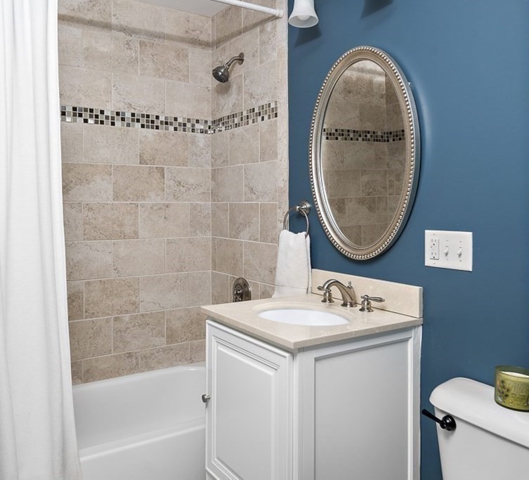 20 Hall Avenue, Unit 2 Somerville, MA 02144 - Photo 13 of 18 a bathroom with a sink and a mirror