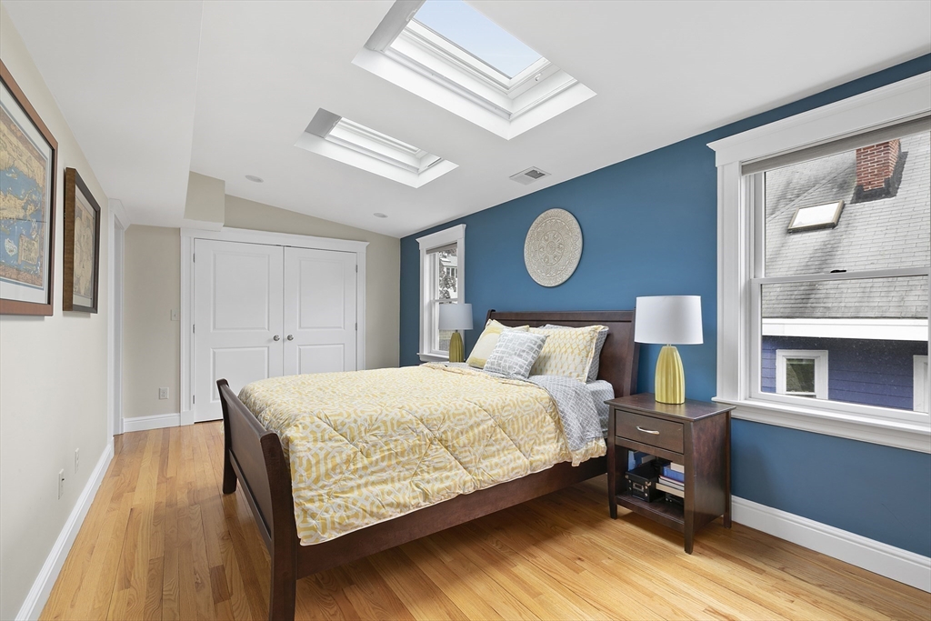 20 Hall Avenue, Unit 2 Somerville, MA 02144 - Photo 7 of 18 a bedroom with a bed and window