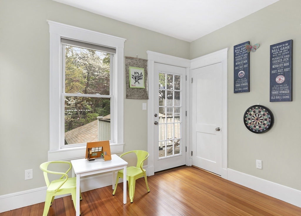 20 Hall Avenue, Unit 2 Somerville, MA 02144 - Photo 10 of 18 a view of a dining room with a table and chairs