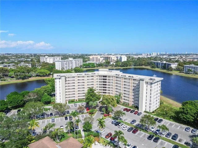 a view of a lake with a building in the background