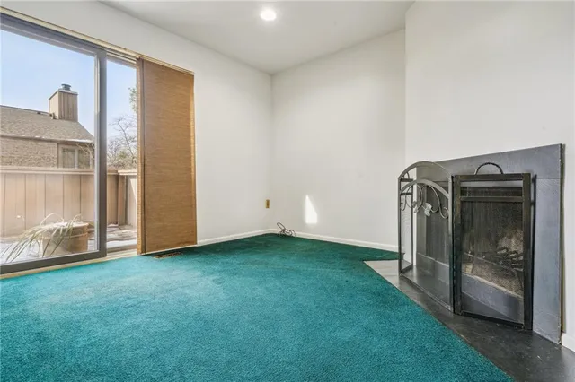 a view of an empty room and window