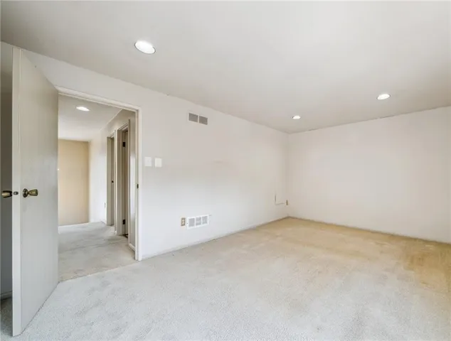 an empty room with an entryway