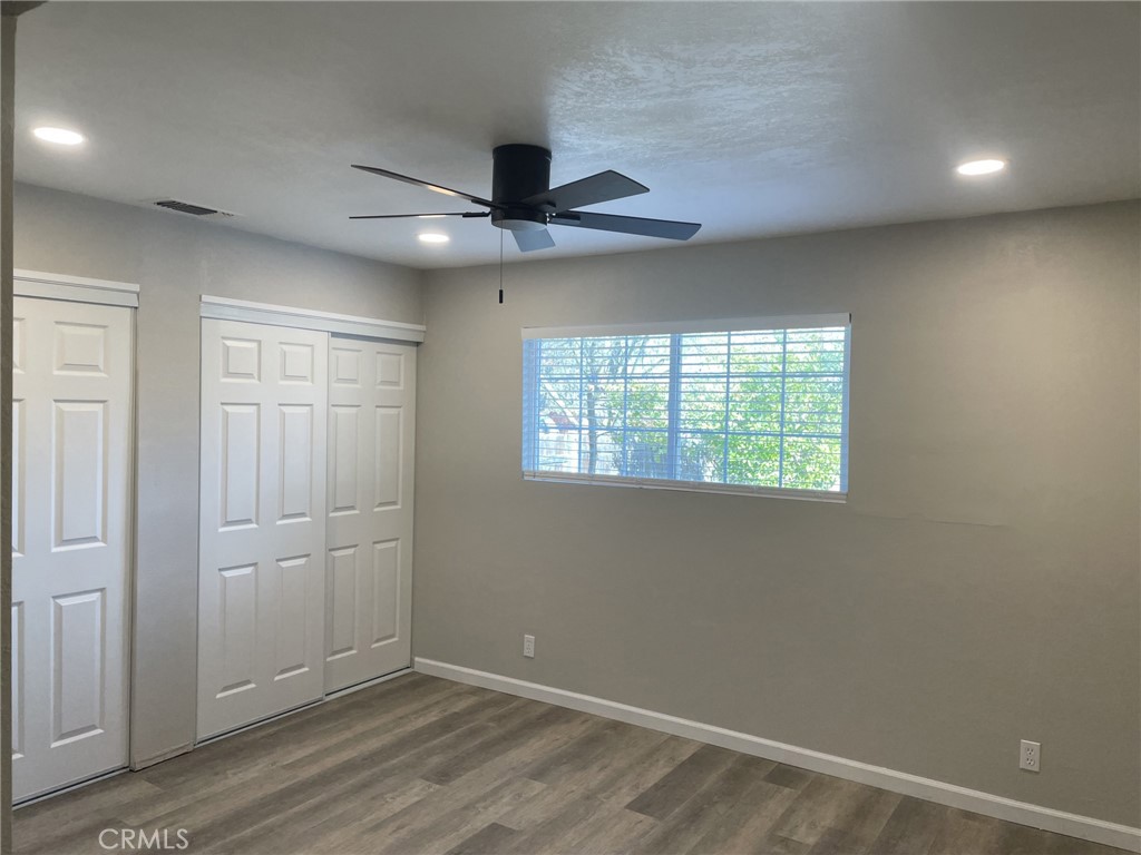 820 North Lassen Street Willows, CA 95988 - Photo 11 of 18 an empty room with windows and fan