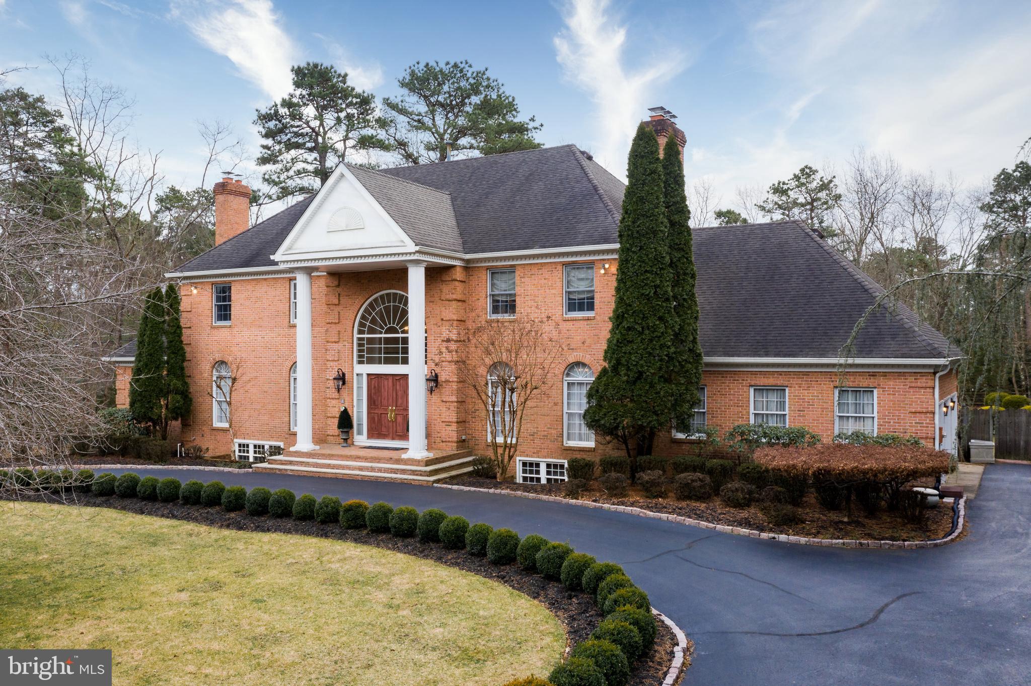 2 Teaberry Drive Medford, NJ 08055 - Photo 1 of 43 front view of a house with a yard