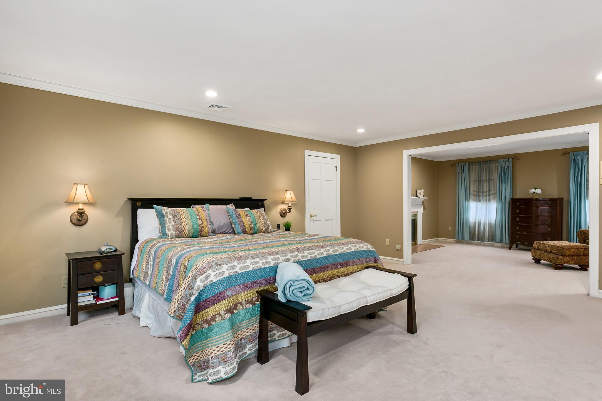 2 Teaberry Drive Medford, NJ 08055 - Photo 16 of 43 a spacious bedroom with a bed and a lamp