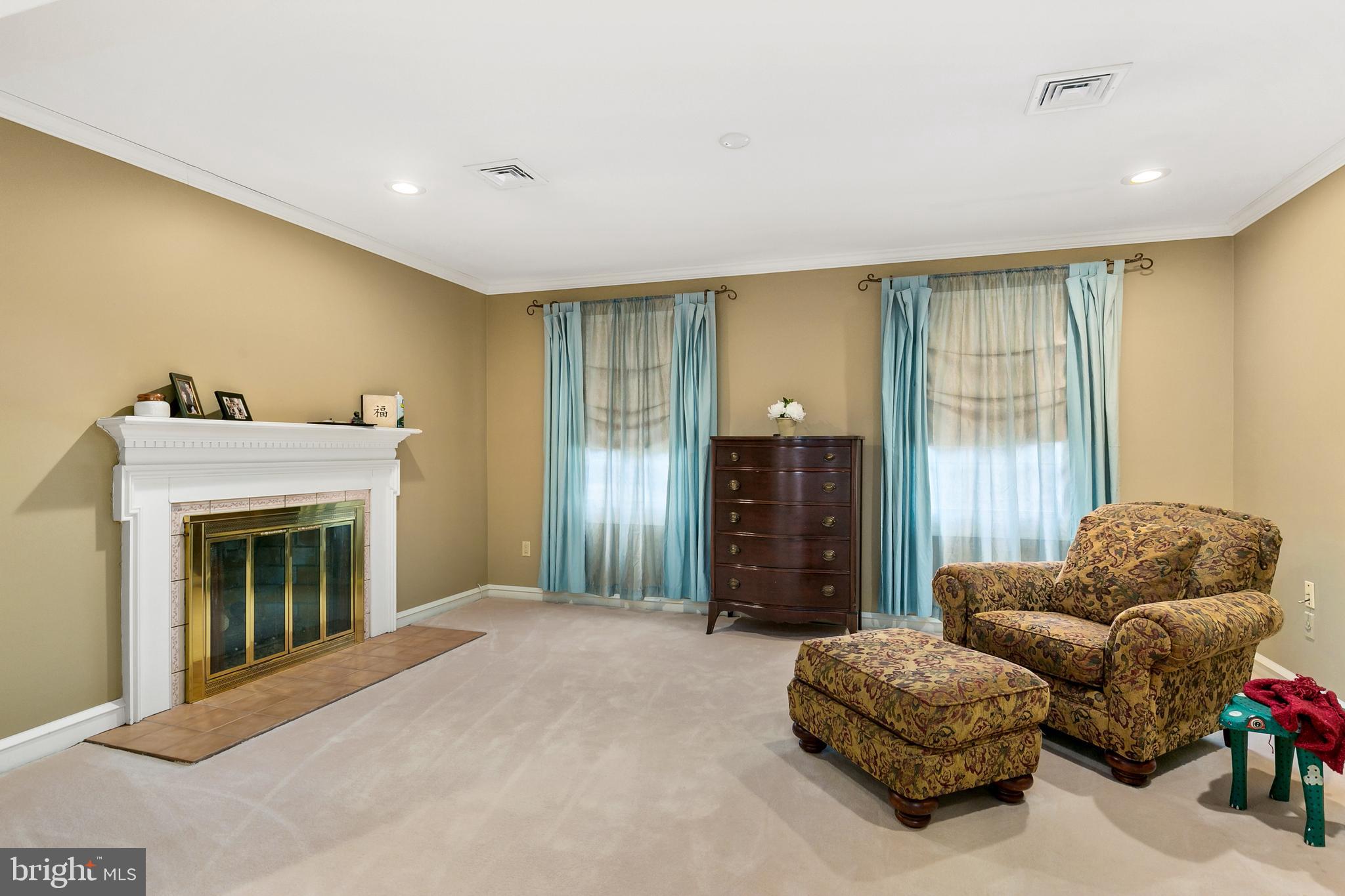 2 Teaberry Drive Medford, NJ 08055 - Photo 17 of 43 a living room with furniture and a fireplace