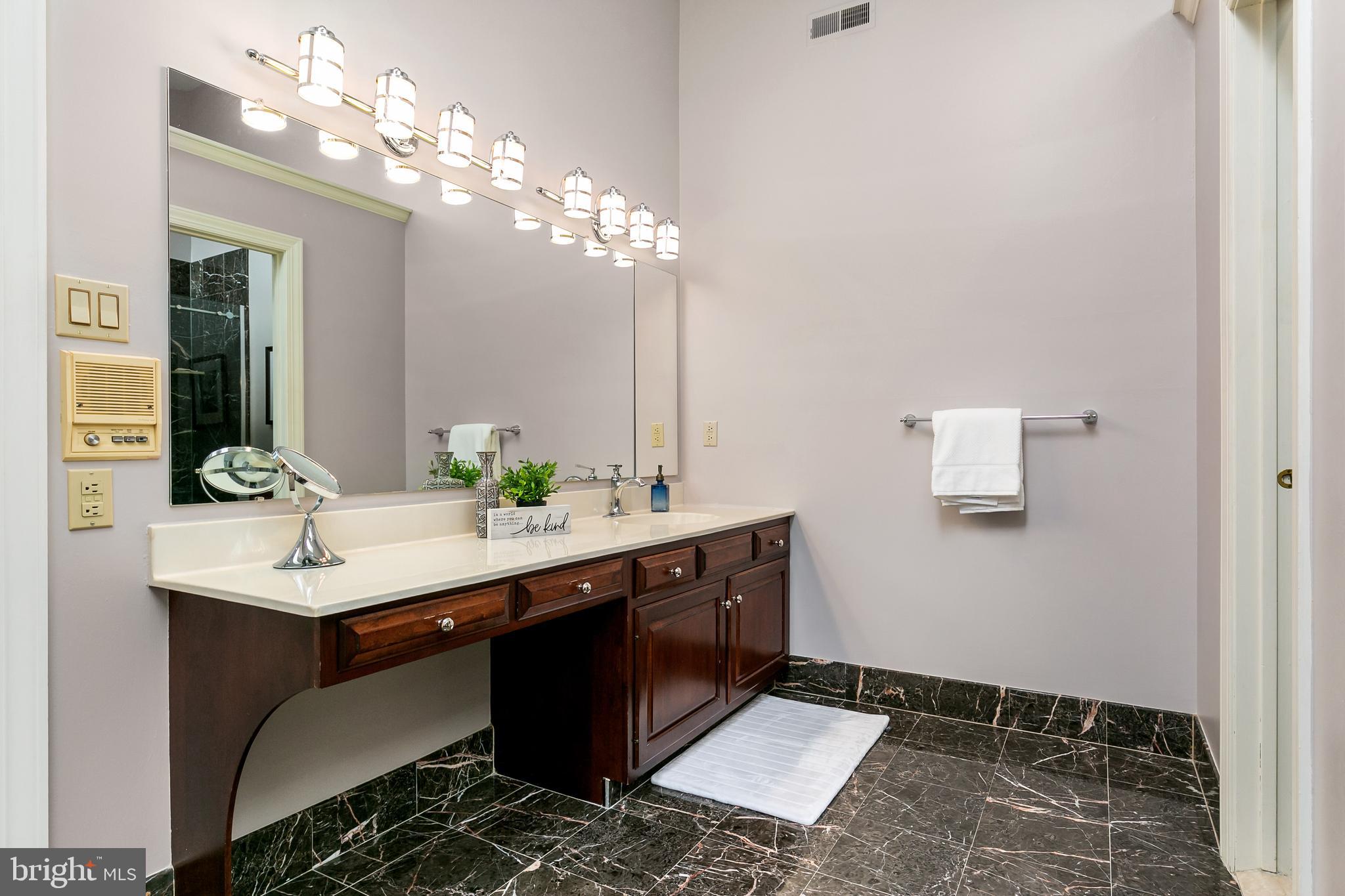 2 Teaberry Drive Medford, NJ 08055 - Photo 20 of 43 a bathroom with a sink and a mirror