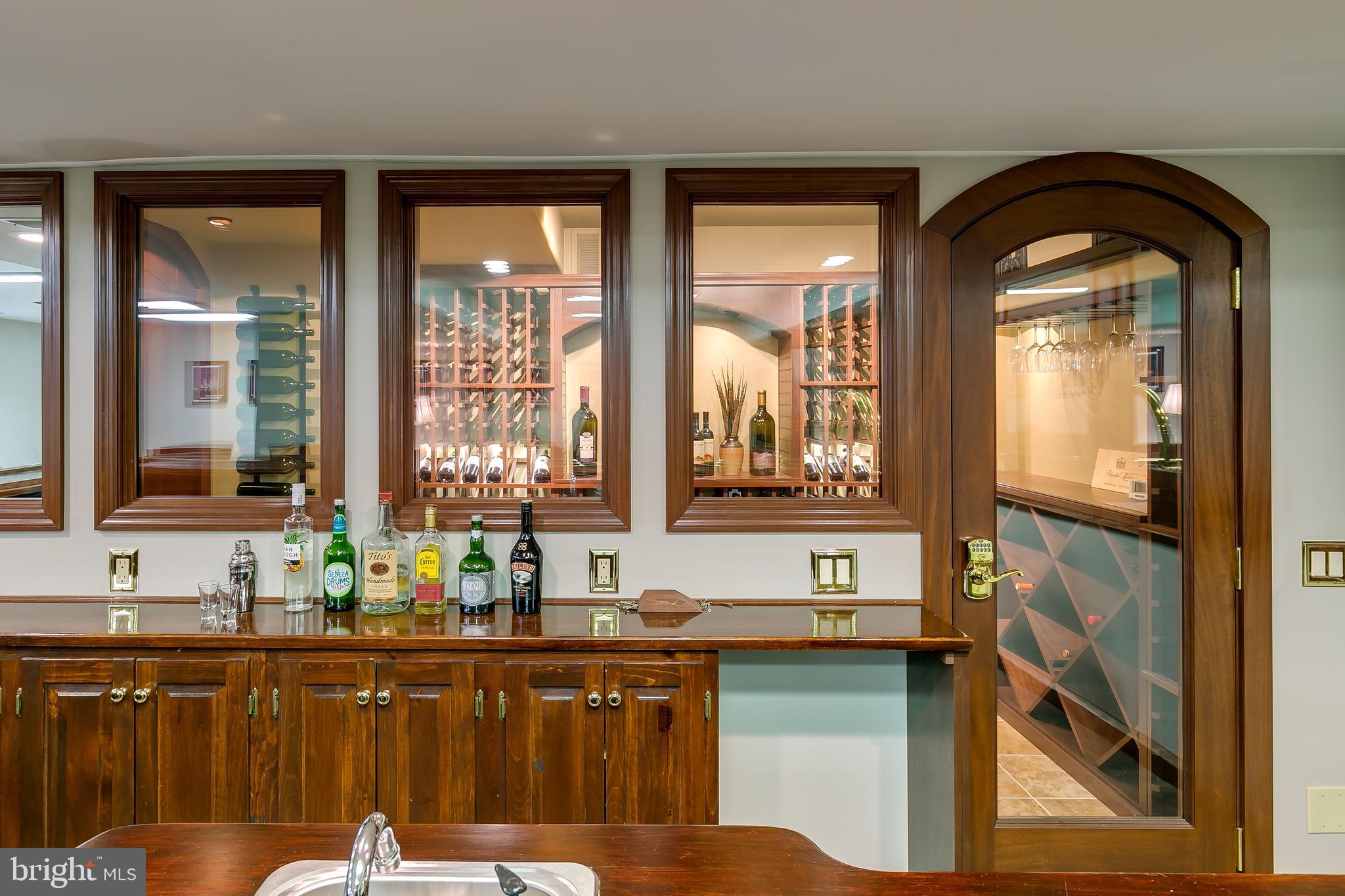 2 Teaberry Drive Medford, NJ 08055 - Photo 29 of 43 a kitchen with a refrigerator a sink and wooden cabinets