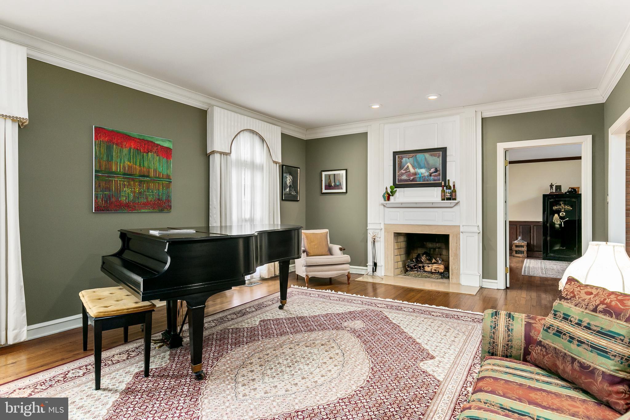 2 Teaberry Drive Medford, NJ 08055 - Photo 4 of 43 a living room with furniture a rug and a fireplace