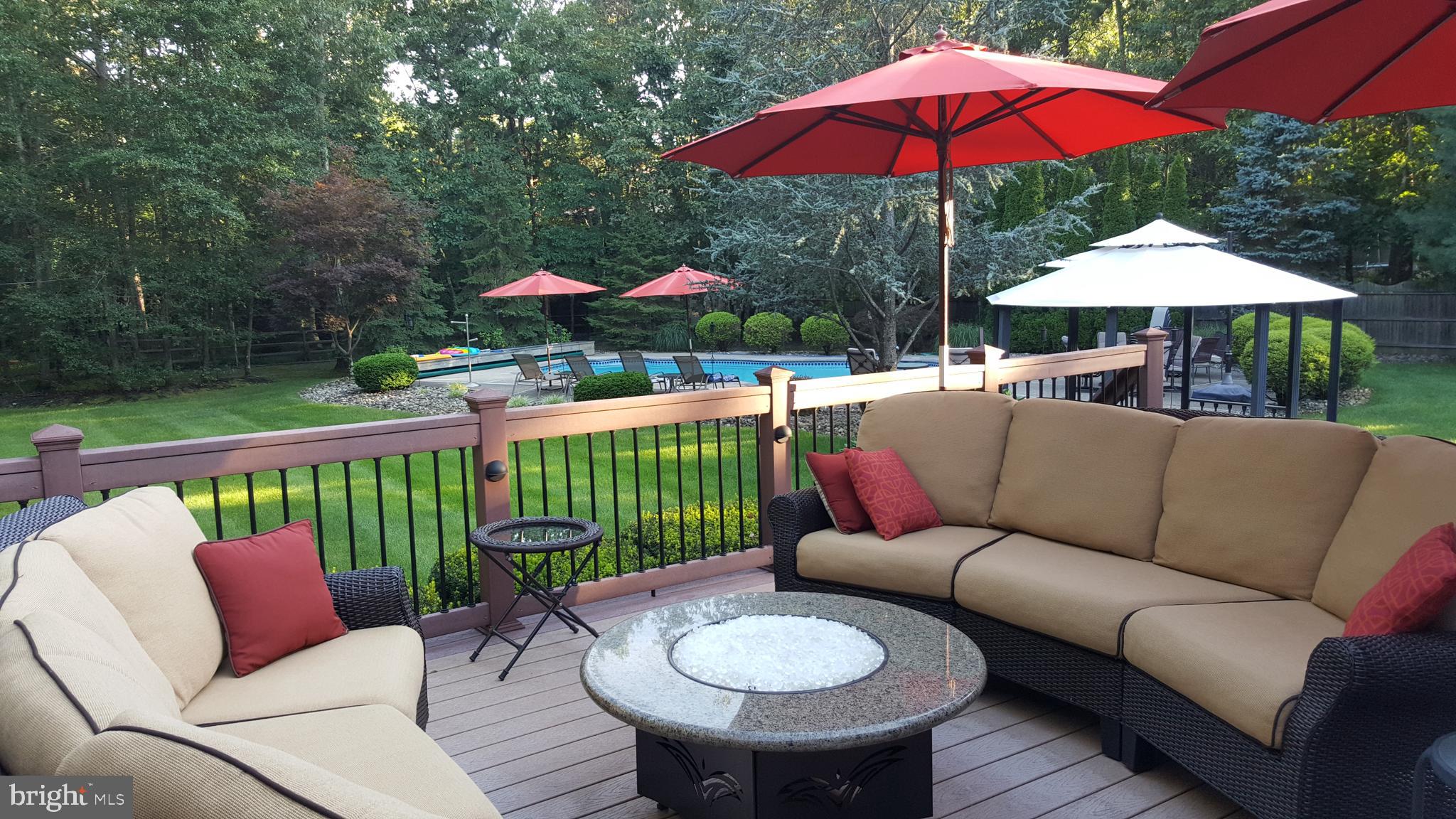 2 Teaberry Drive Medford, NJ 08055 - Photo 33 of 43 a patio with patio a yard and outdoor seating