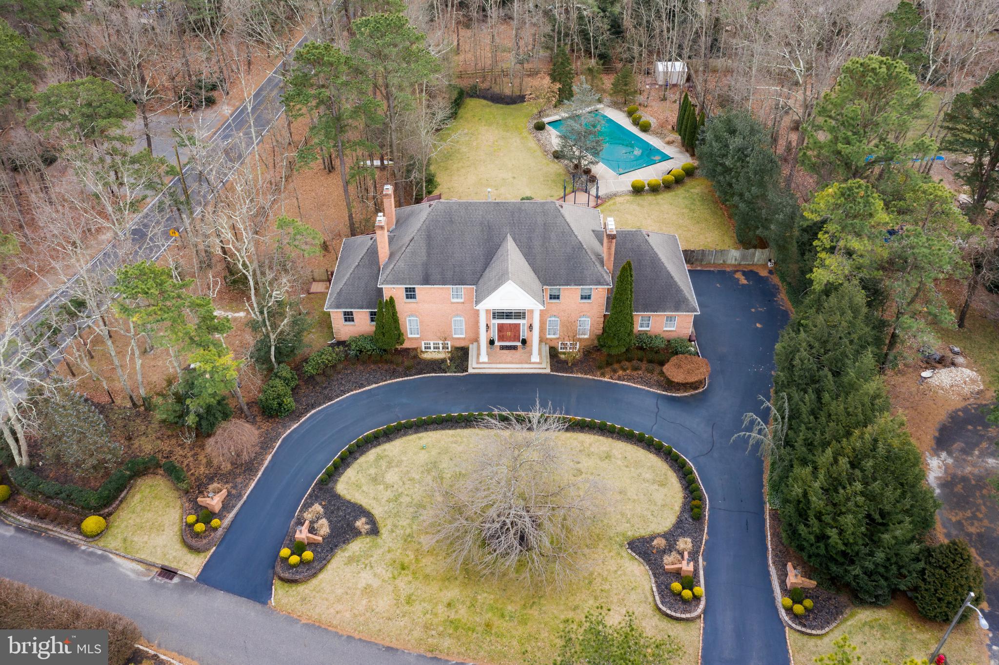 2 Teaberry Drive Medford, NJ 08055 - Photo 37 of 43 a view of swimming pool with a garden