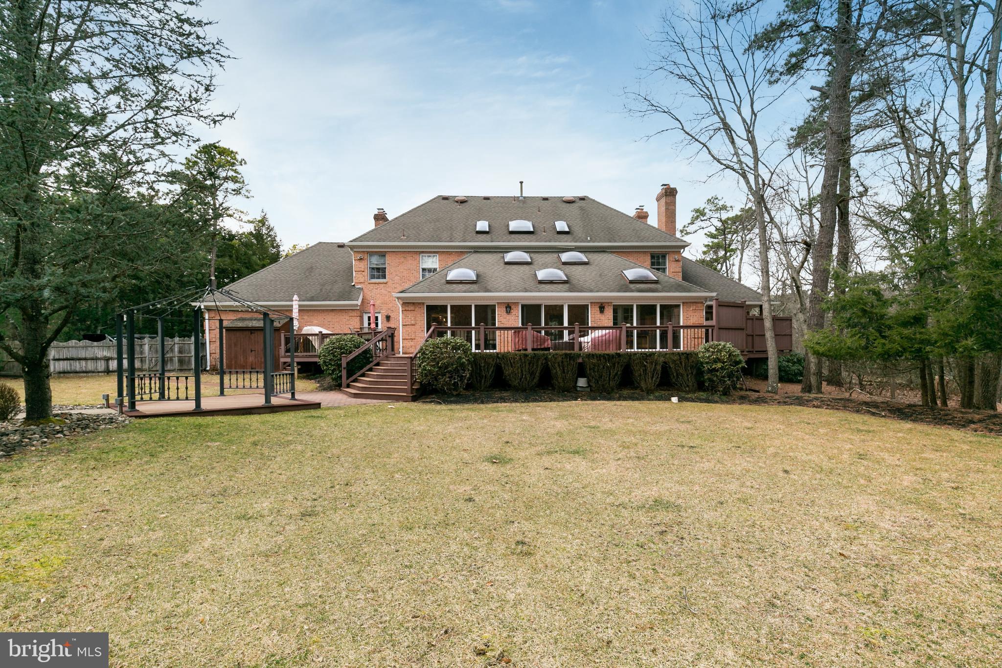 2 Teaberry Drive Medford, NJ 08055 - Photo 39 of 43 a front view of a house with a garden