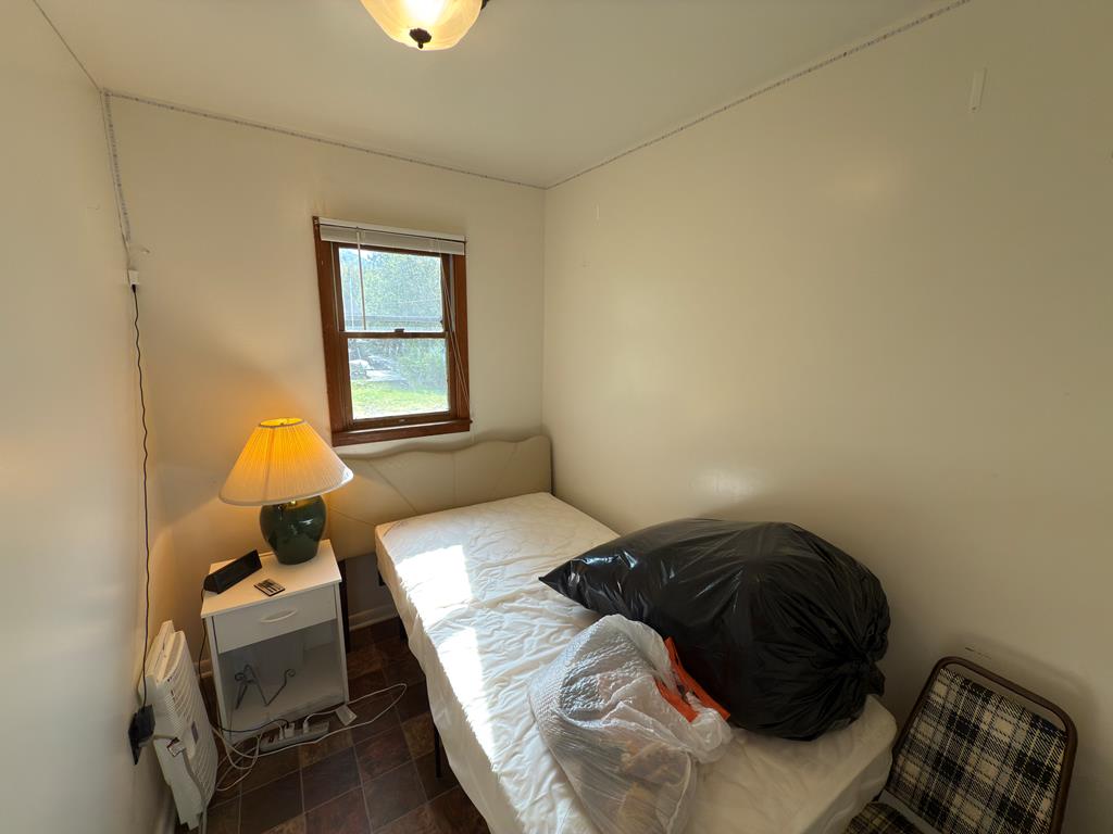 876 North Tunnel Road Kennerdell, PA 16374 - Photo 36 of 43 a bedroom with a bed and window