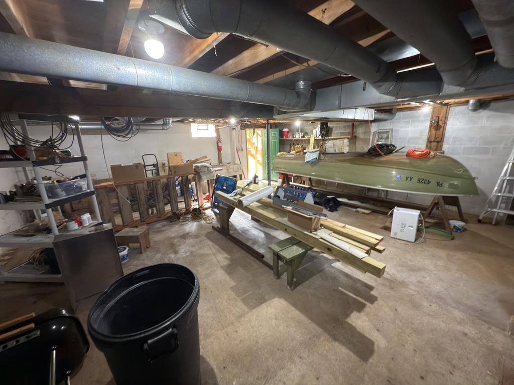876 North Tunnel Road Kennerdell, PA 16374 - Photo 42 of 43 a gym room with lots of gym equipment