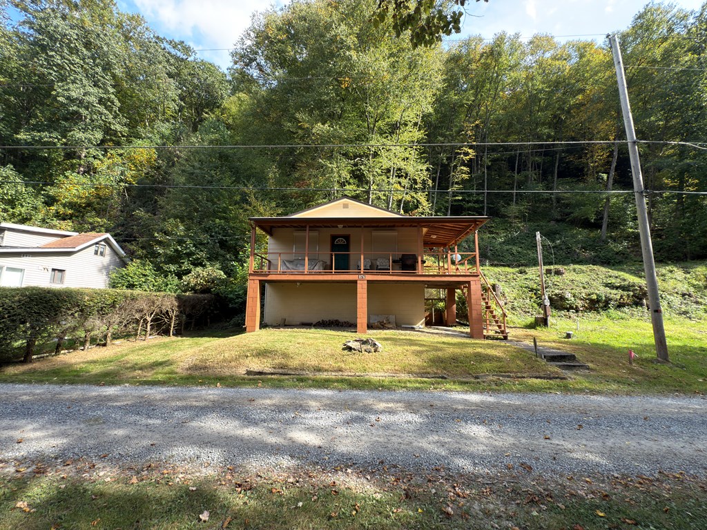 876 North Tunnel Road Kennerdell, PA 16374 - Photo 9 of 43 a house with trees in front of it