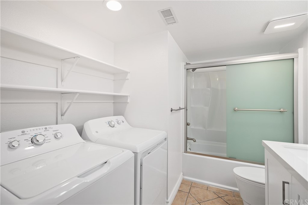 34026 Selva Road, Unit 65 Dana Point, CA 92629 - Photo 17 of 22 a bathroom with a sink a toilet and shower