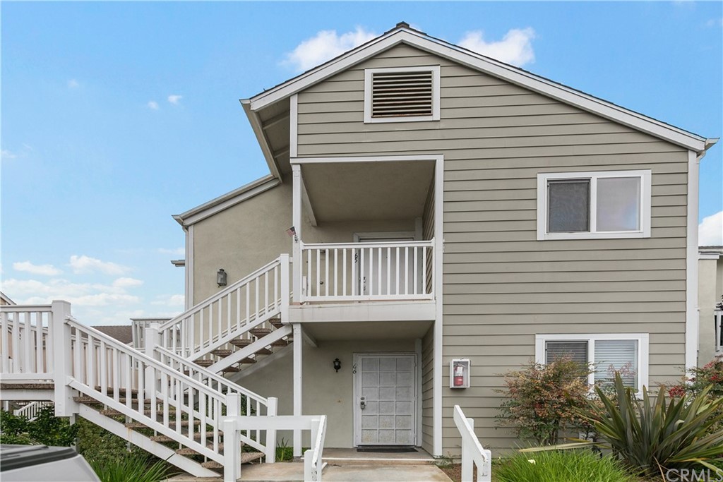 34026 Selva Road, Unit 65 Dana Point, CA 92629 - Photo 21 of 22 a view of a house with wooden deck