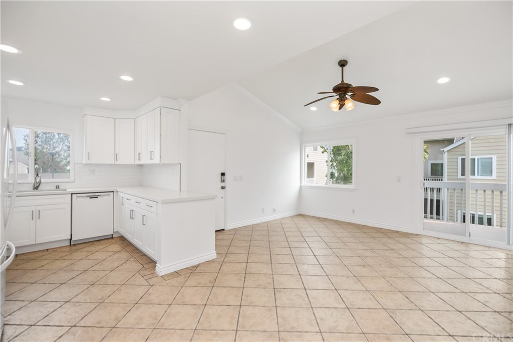 34026 Selva Road, Unit 65 Dana Point, CA 92629 - Photo 4 of 22 a kitchen with a sink cabinets and window