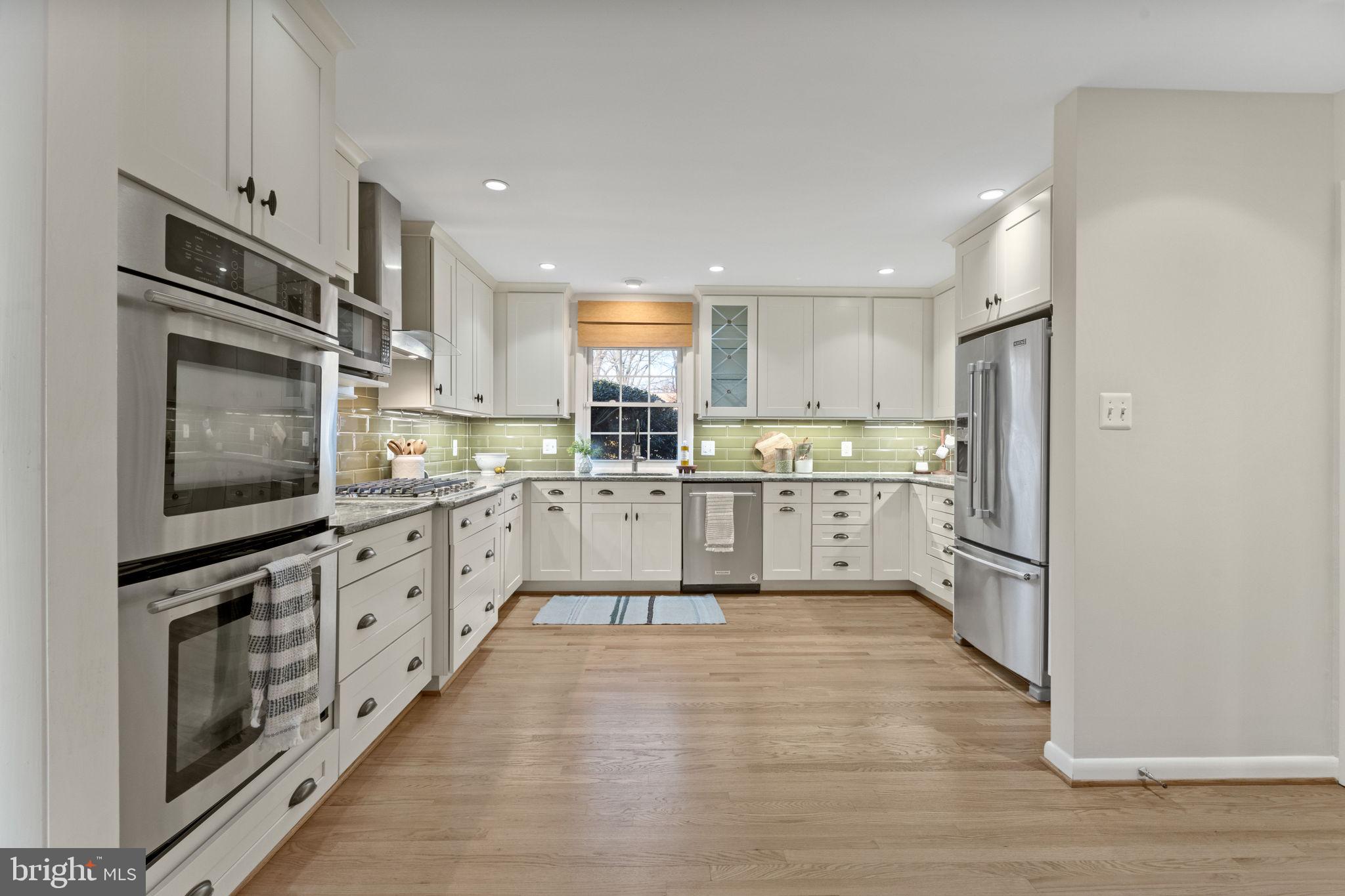 2407 Culpeper Road Alexandria, VA 22308 - Photo 13 of 57 Stylish and bright. Dedicated cabinets for pantry.