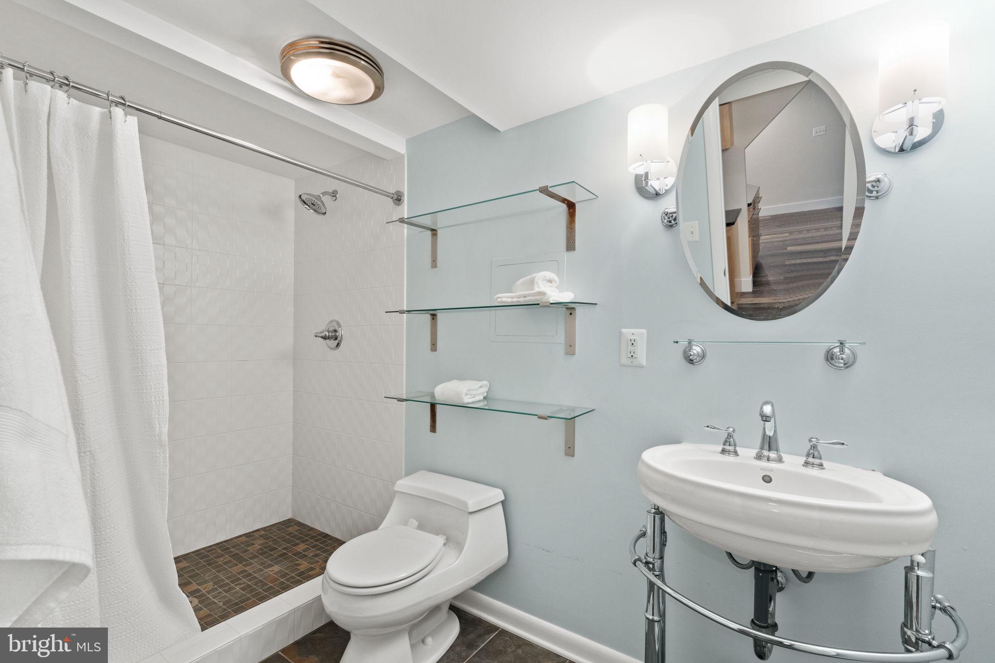 2407 Culpeper Road Alexandria, VA 22308 - Photo 46 of 57 Full bathroom on lower level with walk-in shower.