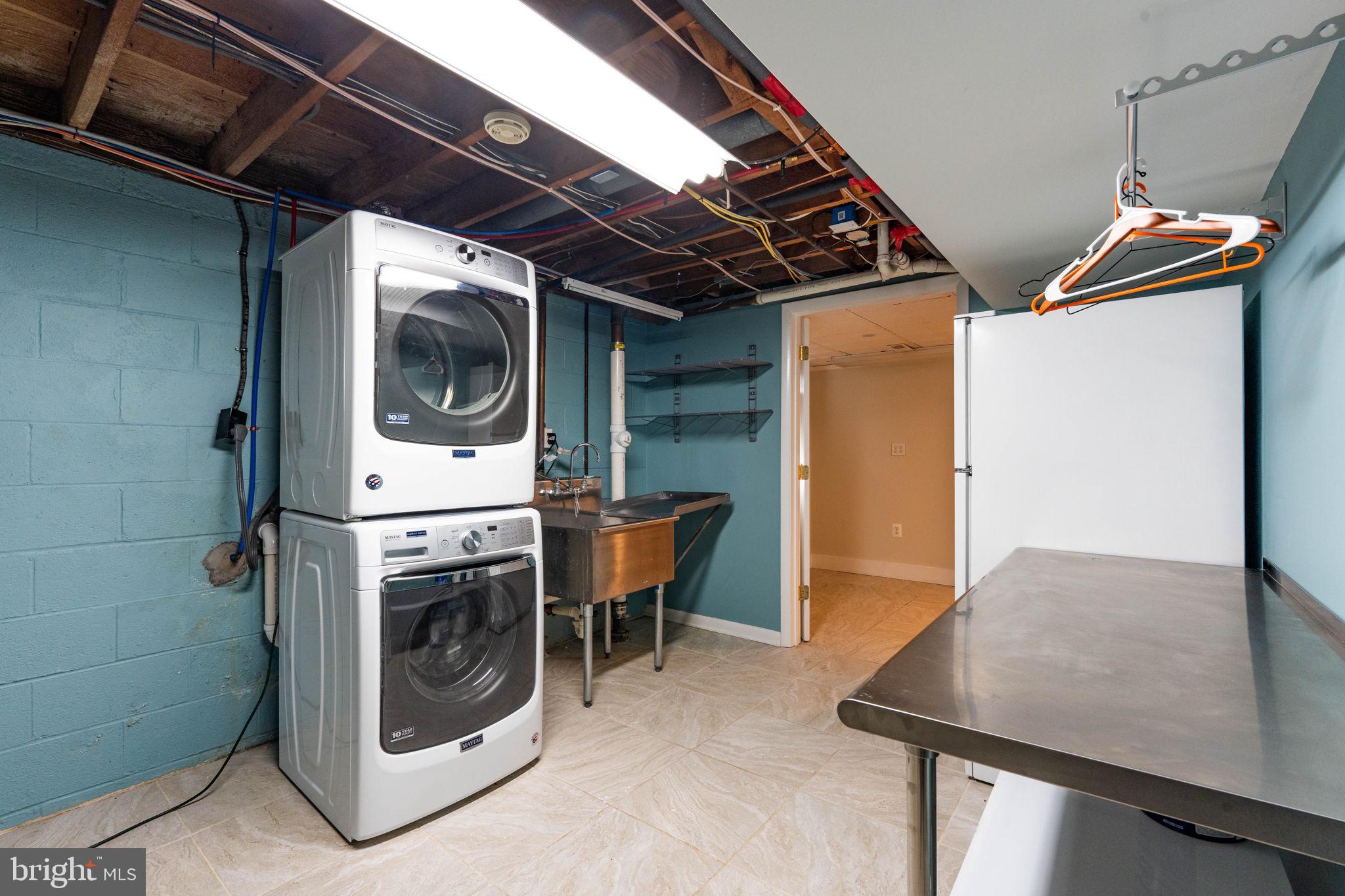 2407 Culpeper Road Alexandria, VA 22308 - Photo 47 of 57 Large laundry room w/utility sink & folding table.