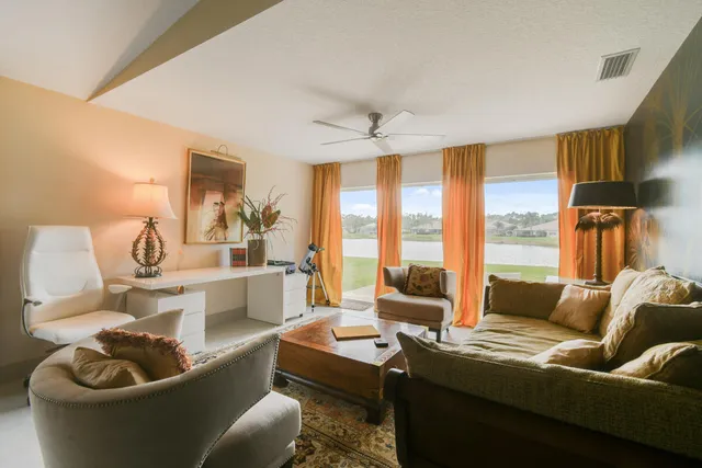 a bed room with a bed and a window