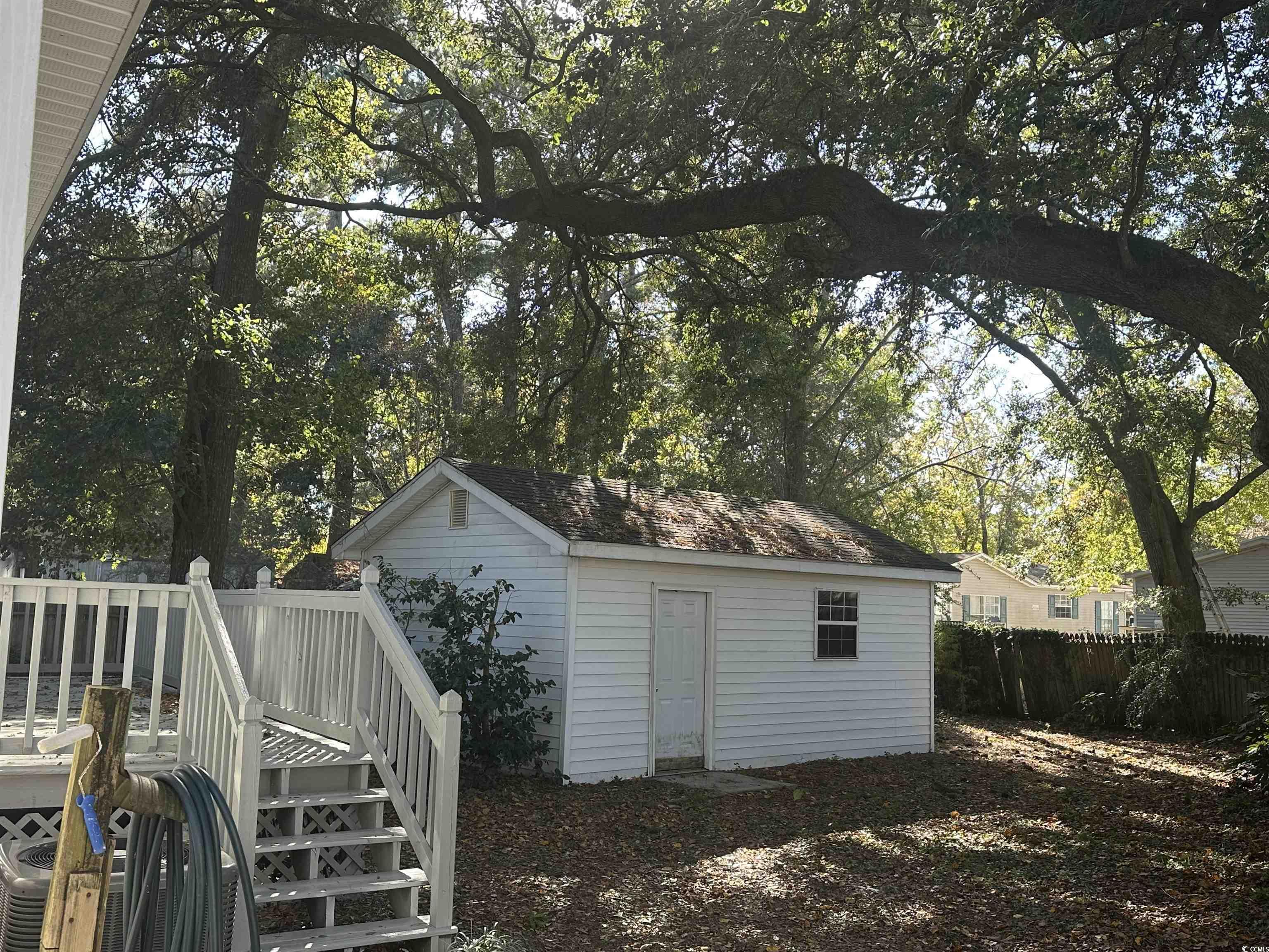 3800 Murrells Inlet Road Murrells Inlet, SC 29576 - Photo 15 of 22 View of outbuilding with view of wooded area